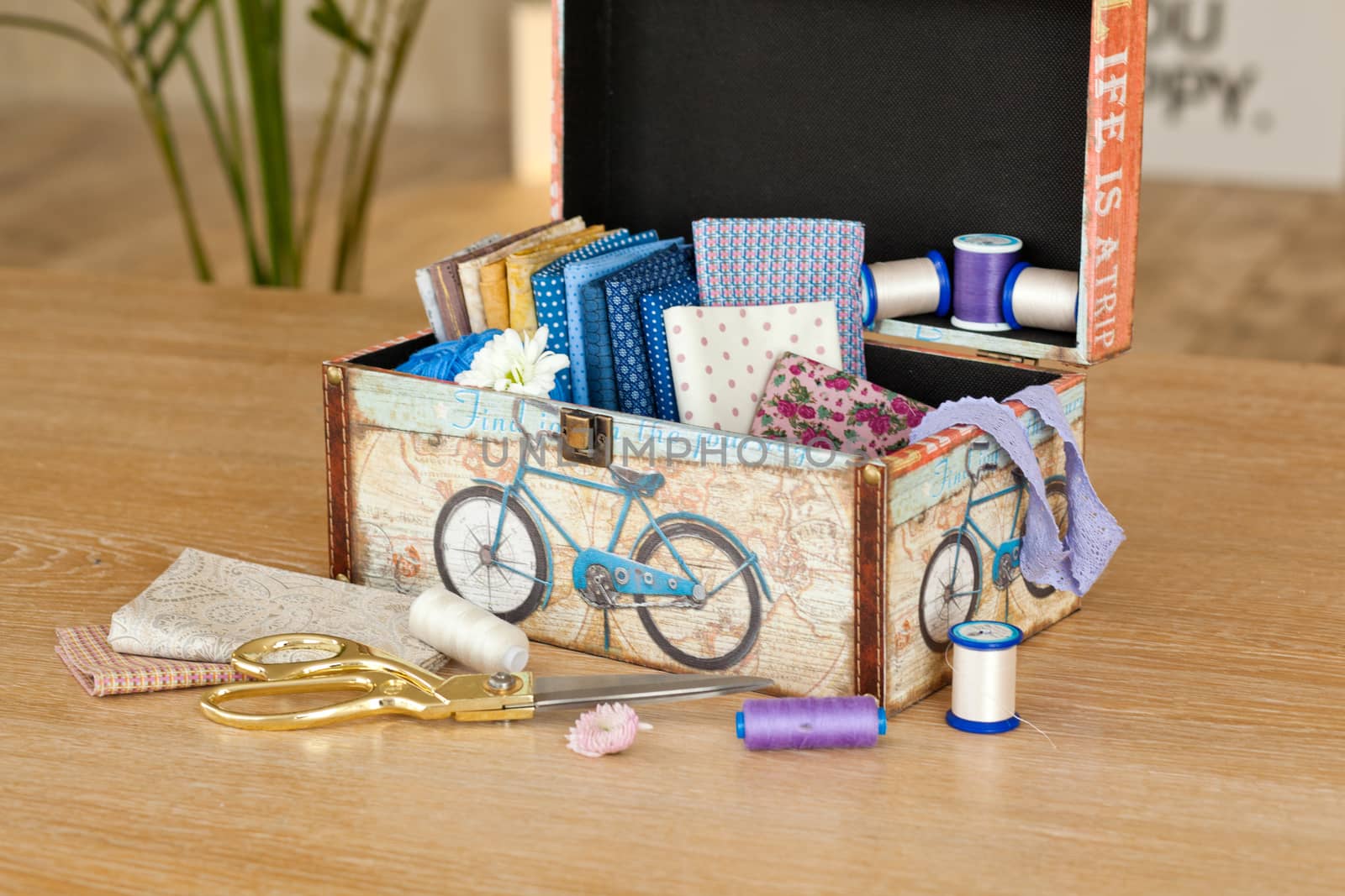 casket for needlework with flower, sewing in style interior