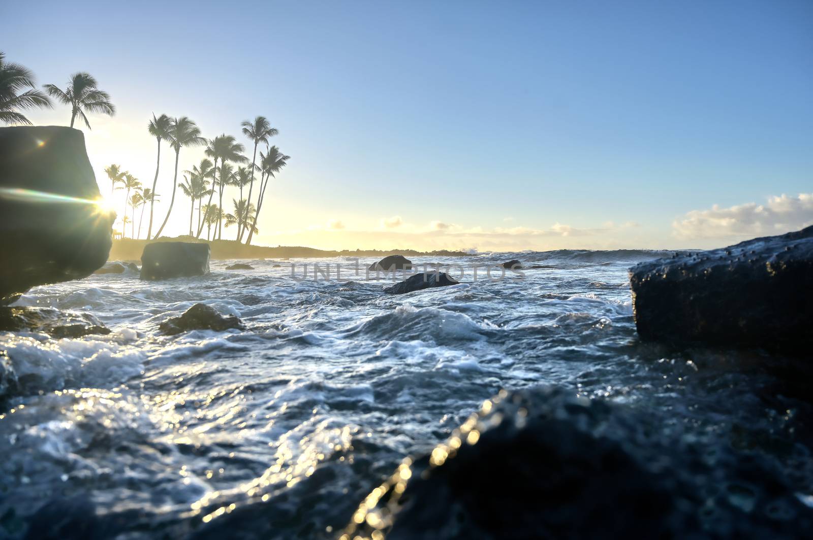 The sunrise over the beach in Kauai, Hawaii