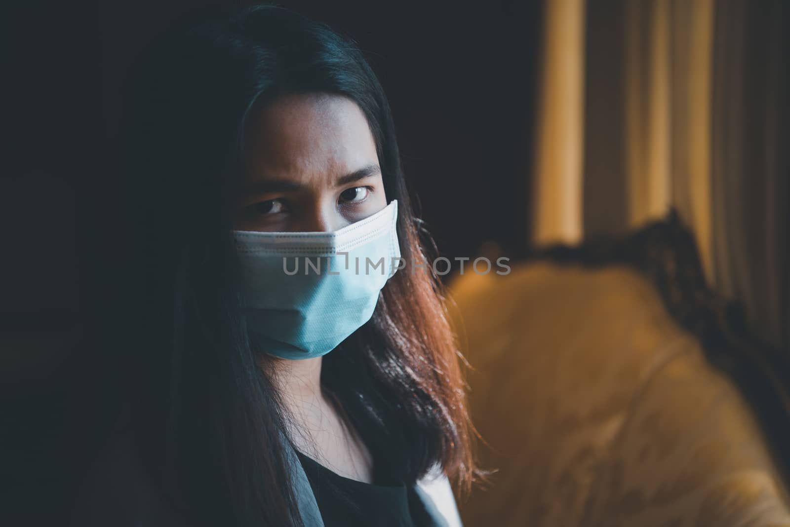 Asian pretty woman wearing mask respiratory protection mask against epidemic flu covid19 or corona virus influenza in office with fear emotion in concept illness, outbreak, healthcare in life