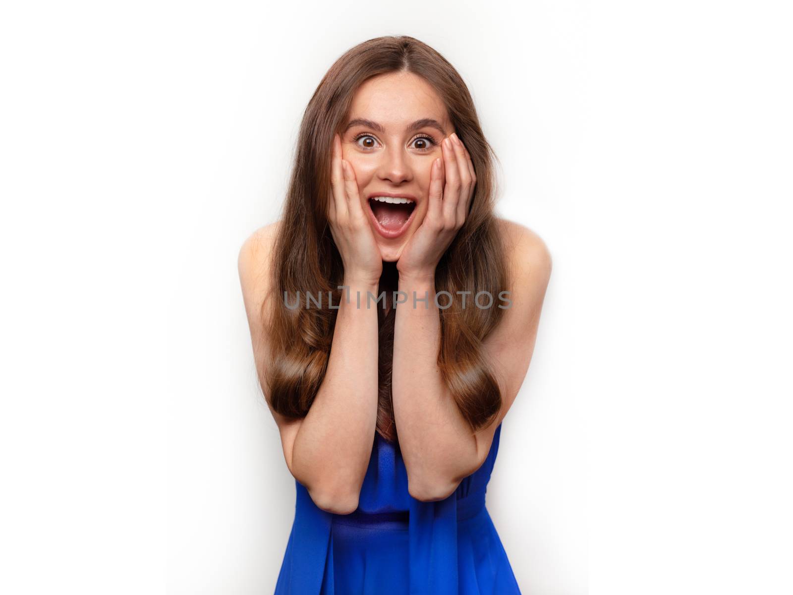 Image of excited screaming young woman isolated by timwit