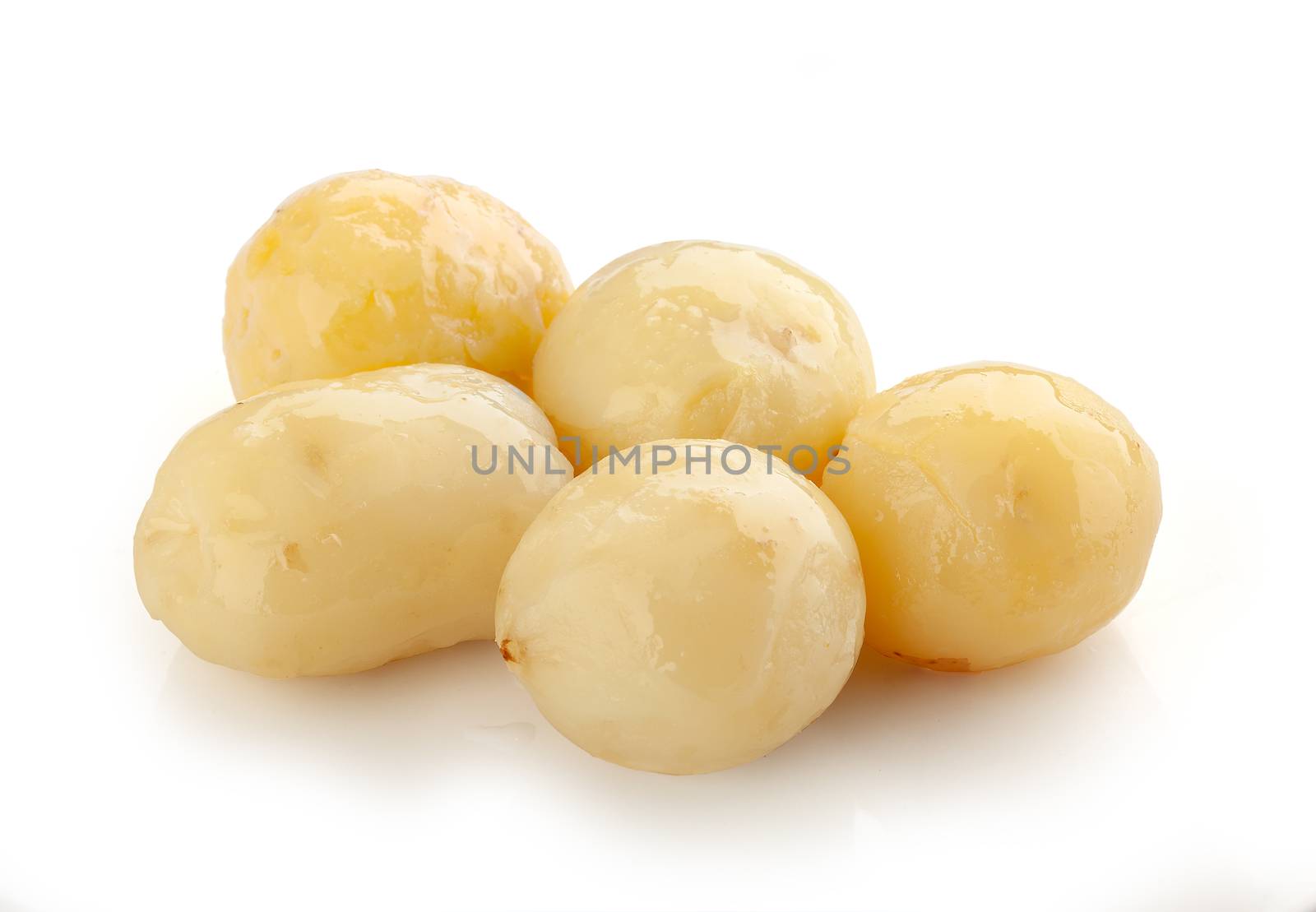 Isolated heap of boiled potatoes on the white background