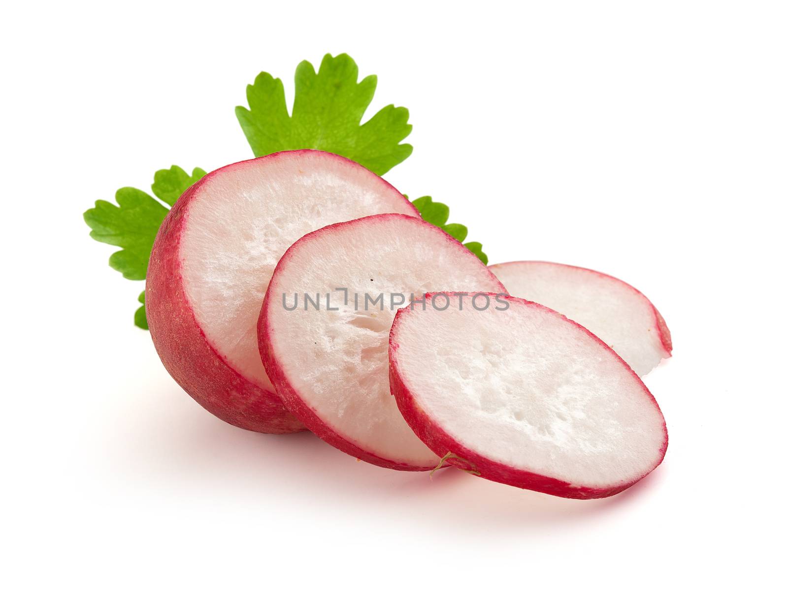 Isolated sliced radish with green parsley on the white