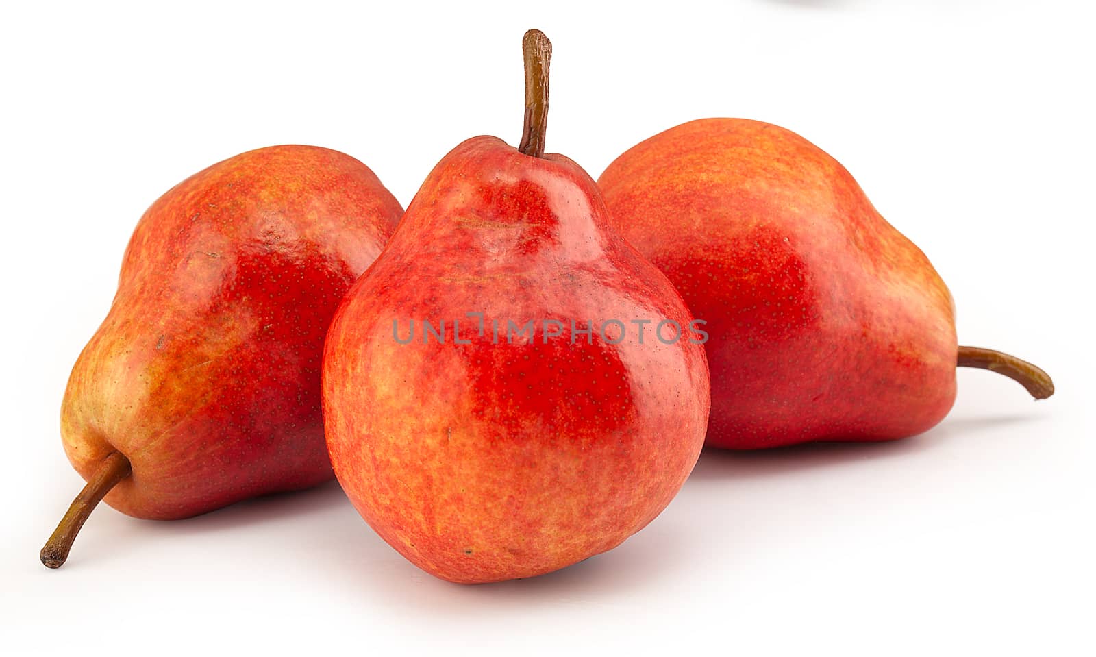 Isolated three red pears on the white background