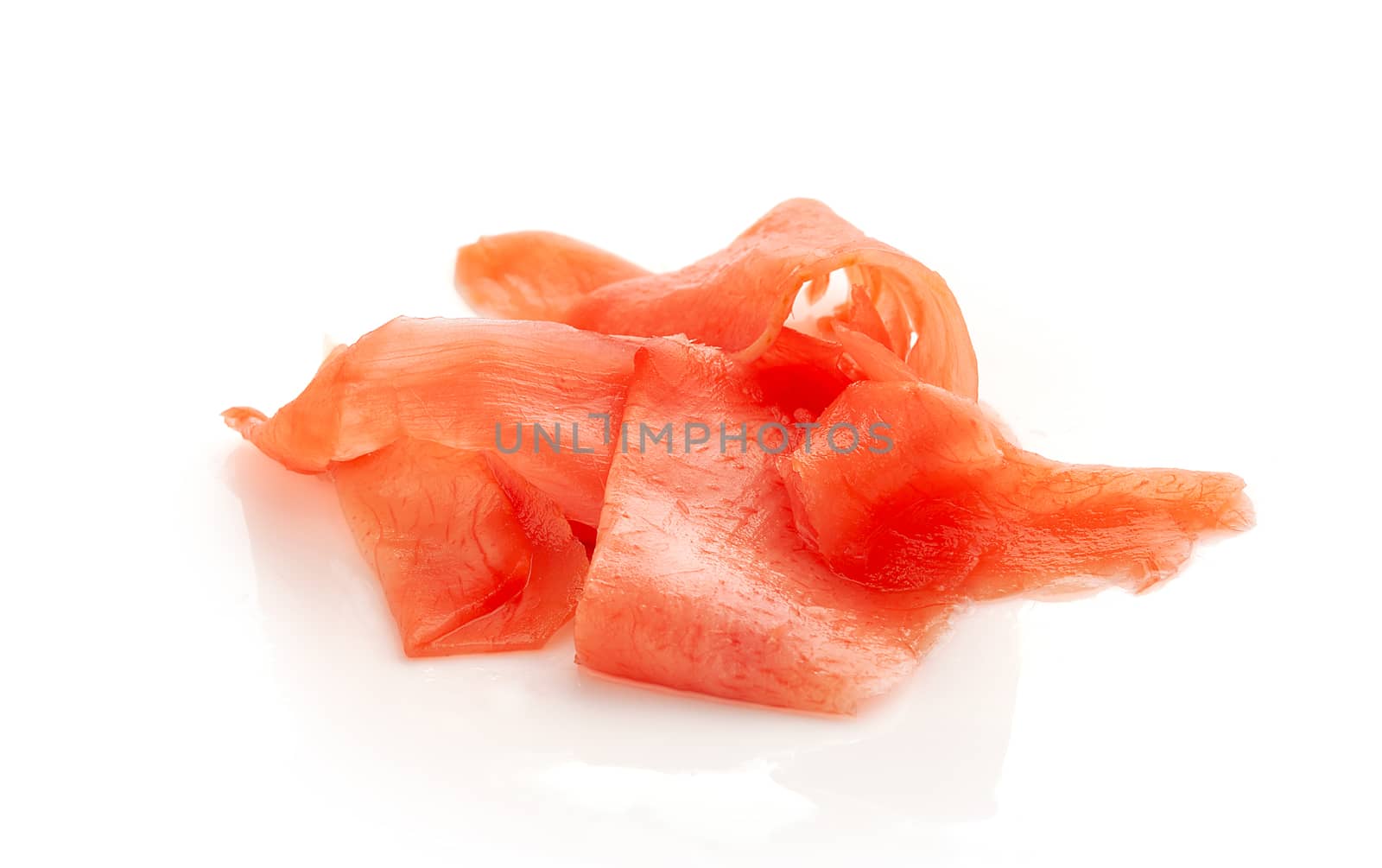 Isolated handul of red pickled ginger on the white