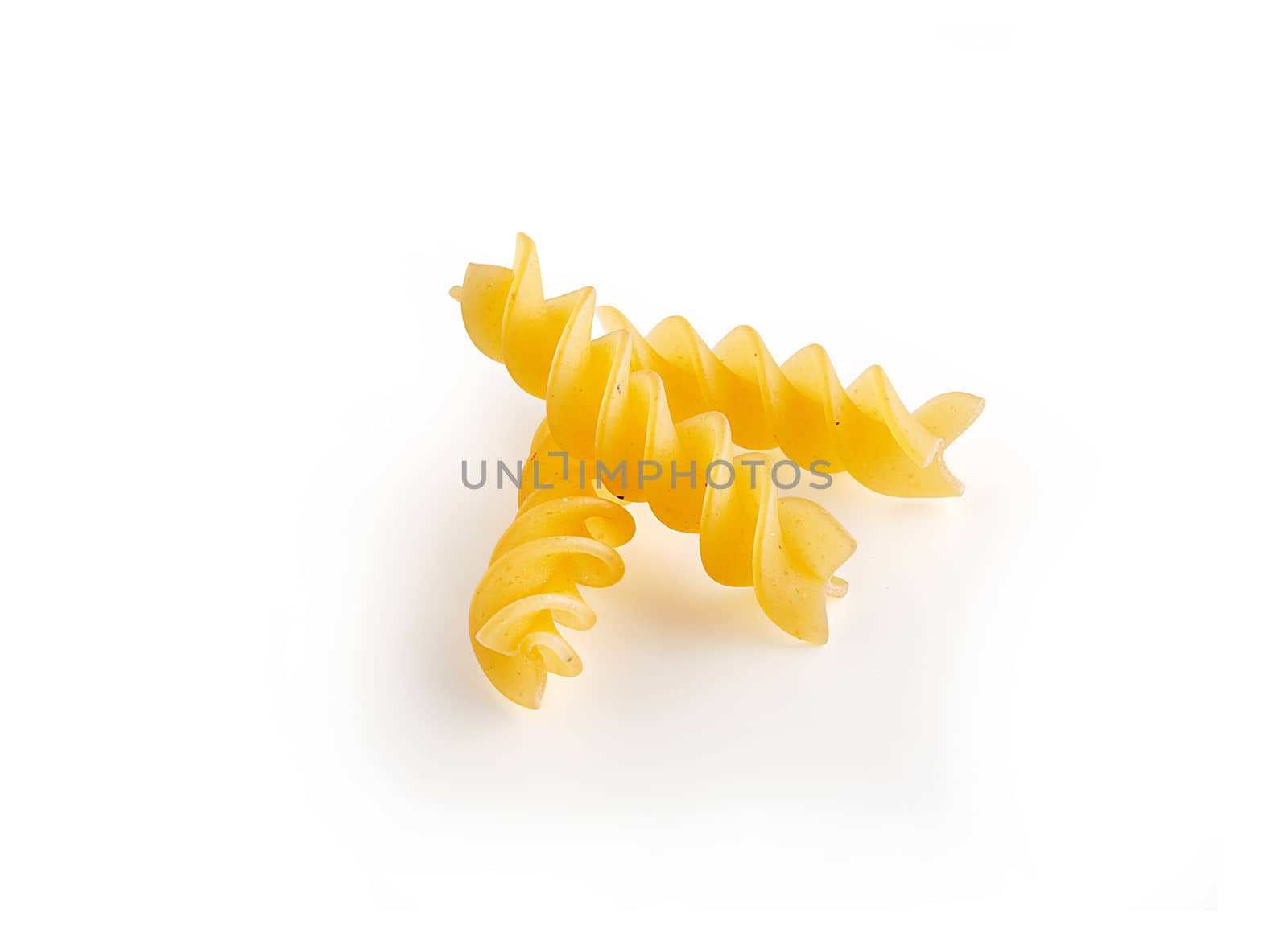 Isolated raw pasta on the white