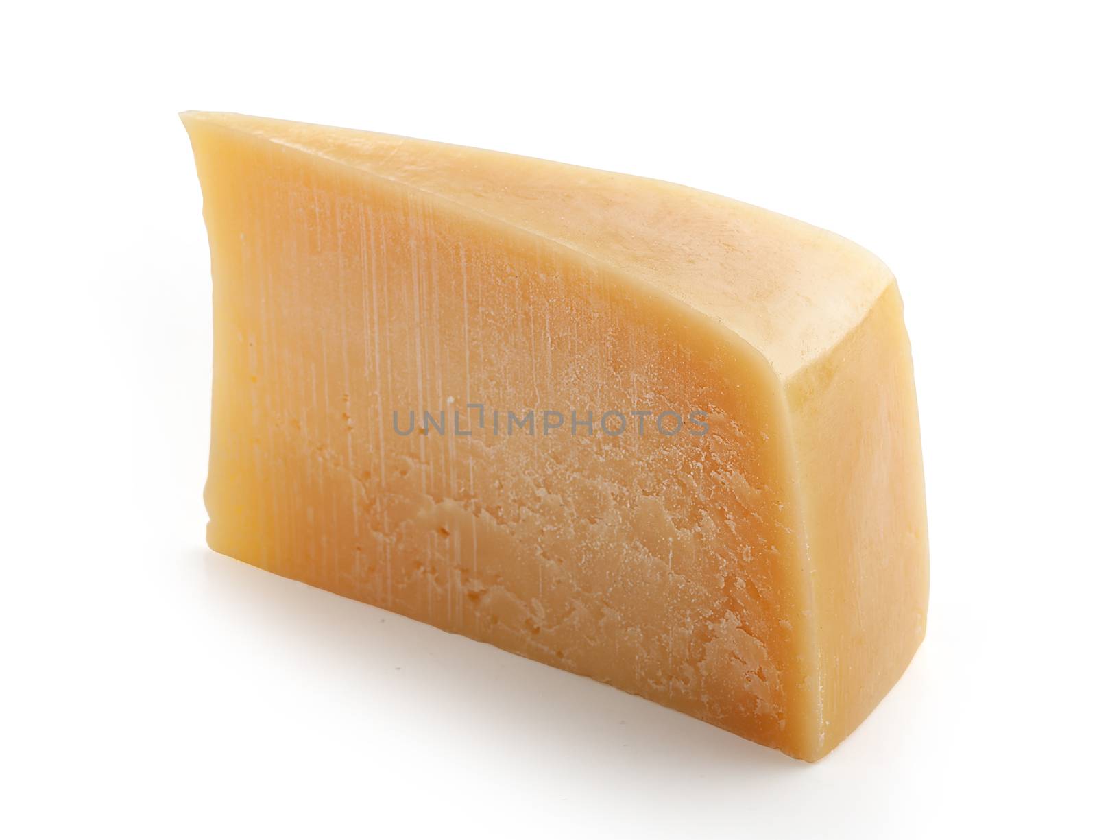 Isolated slice of parmesan cheese on the white background