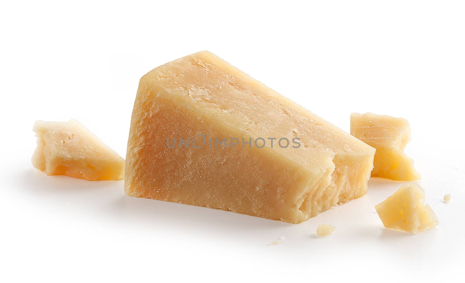 Isolated pieces of parmesan cheese on the white background