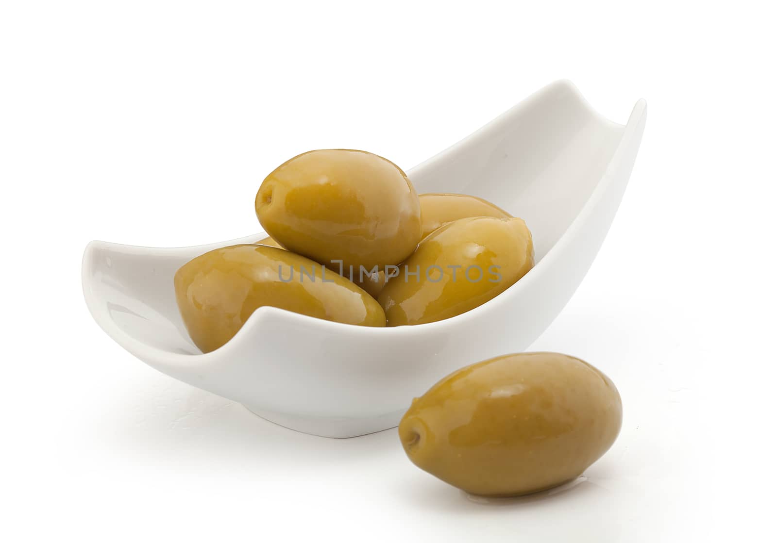 Isolated heap of marinated olives in the bowl
