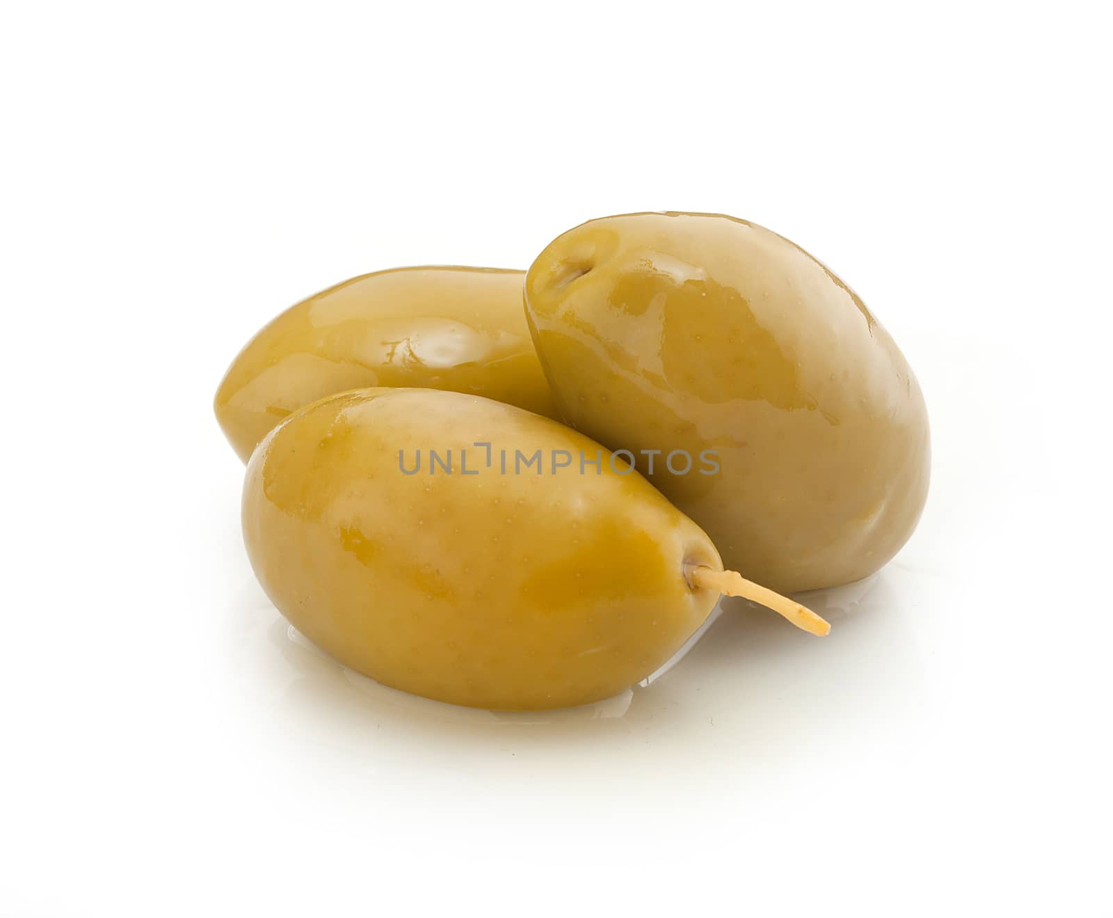 Isolated heap of marinated olives on the white