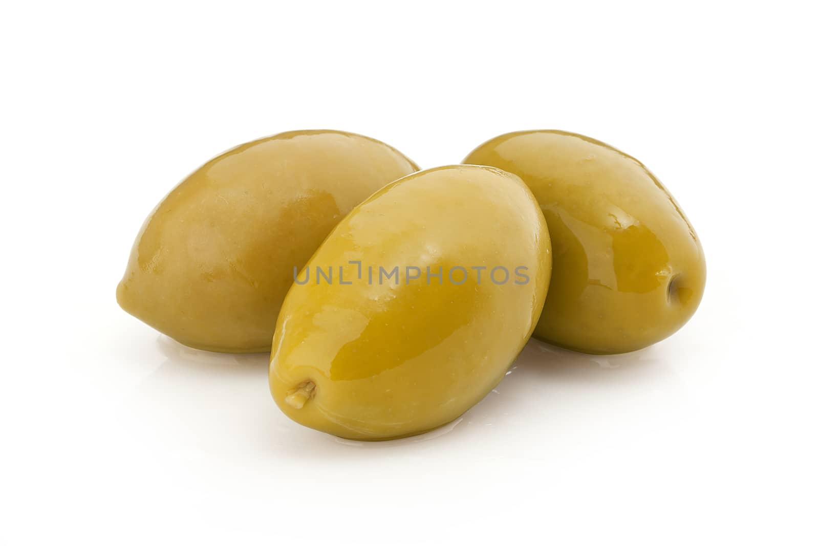 Isolated heap of marinated olives on the white