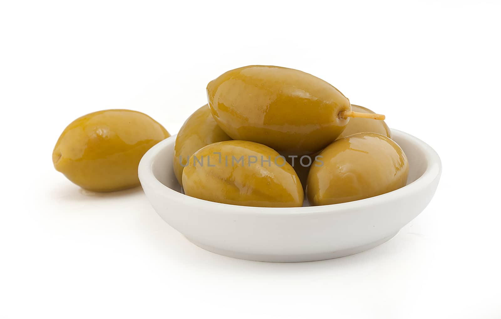 Isolated heap of marinated olives in the bowl