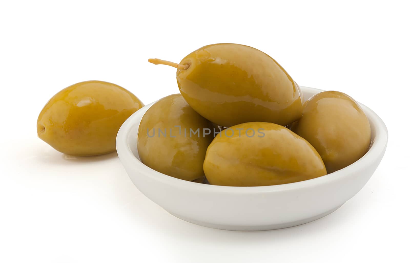 Isolated heap of marinated olives in the bowl
