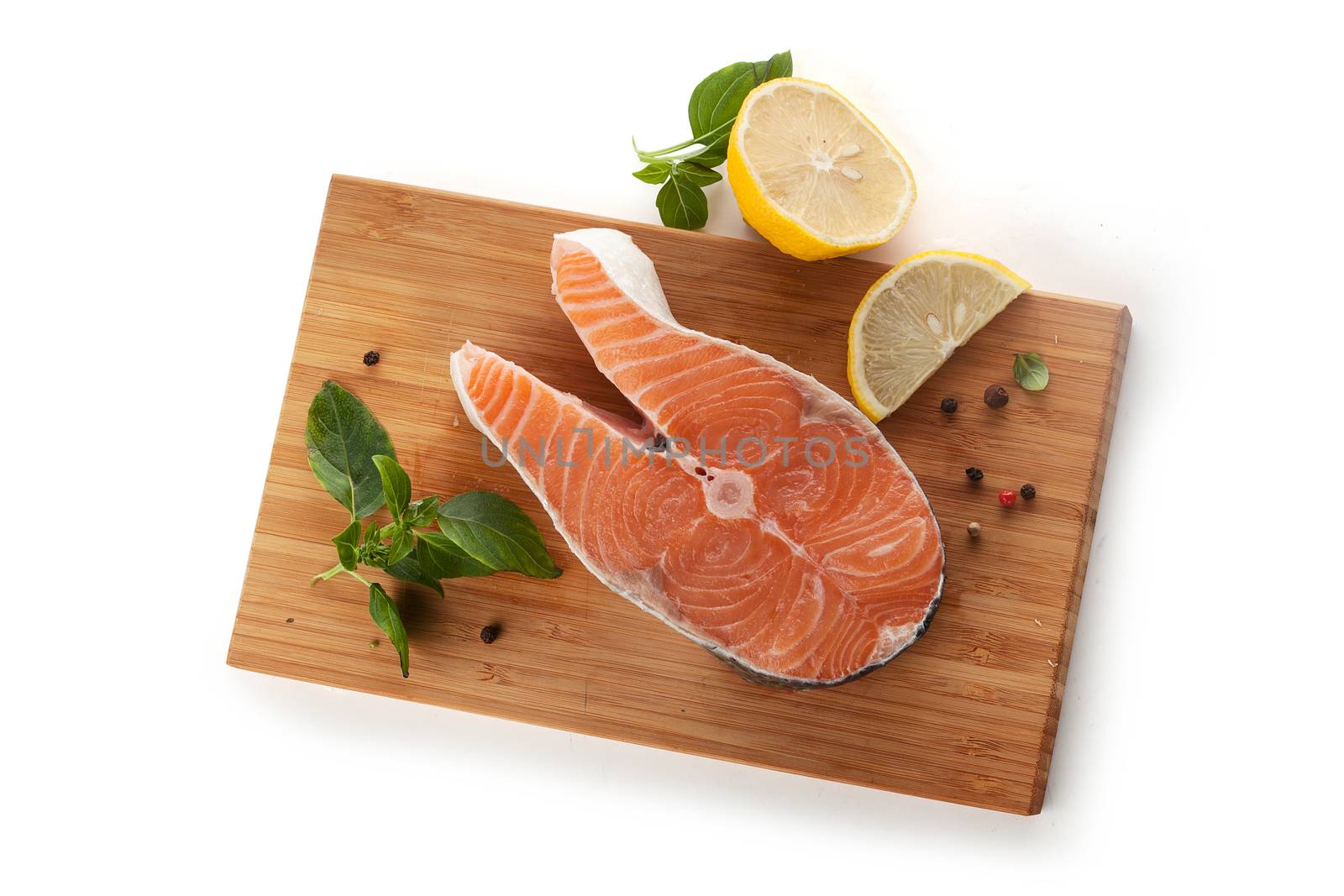 Steak of salmon with lemon and basil by Angorius