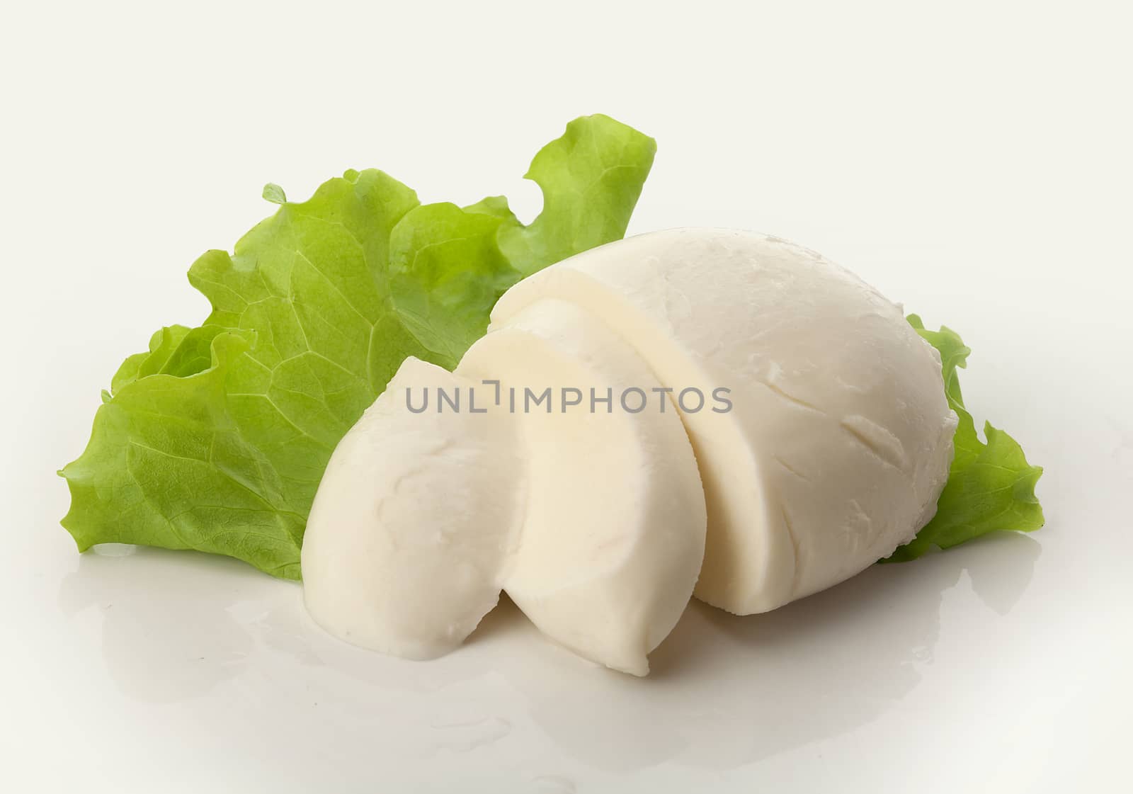 Sliced ball of mozzarella by Angorius