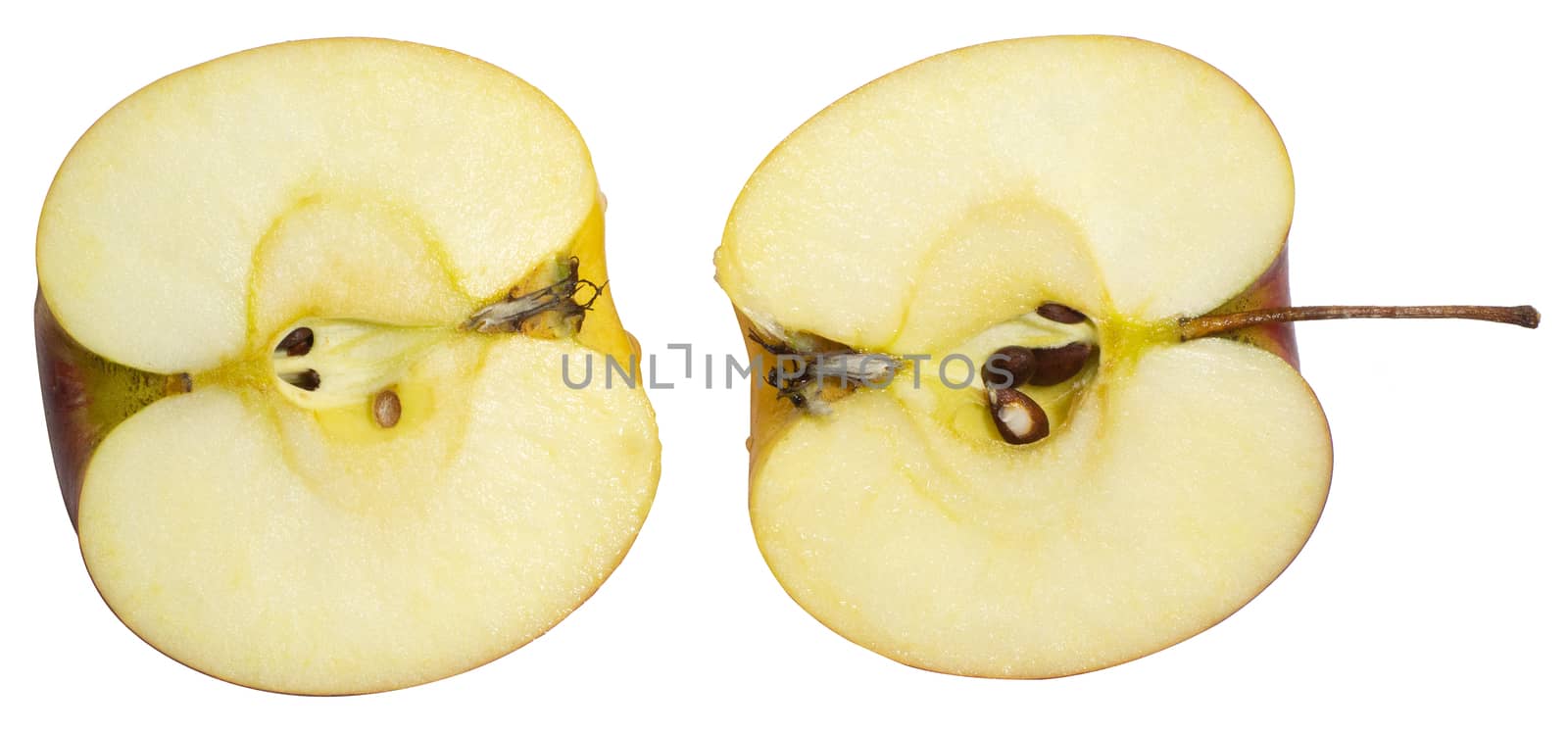 two ripe delicious juicy apples, cut in half