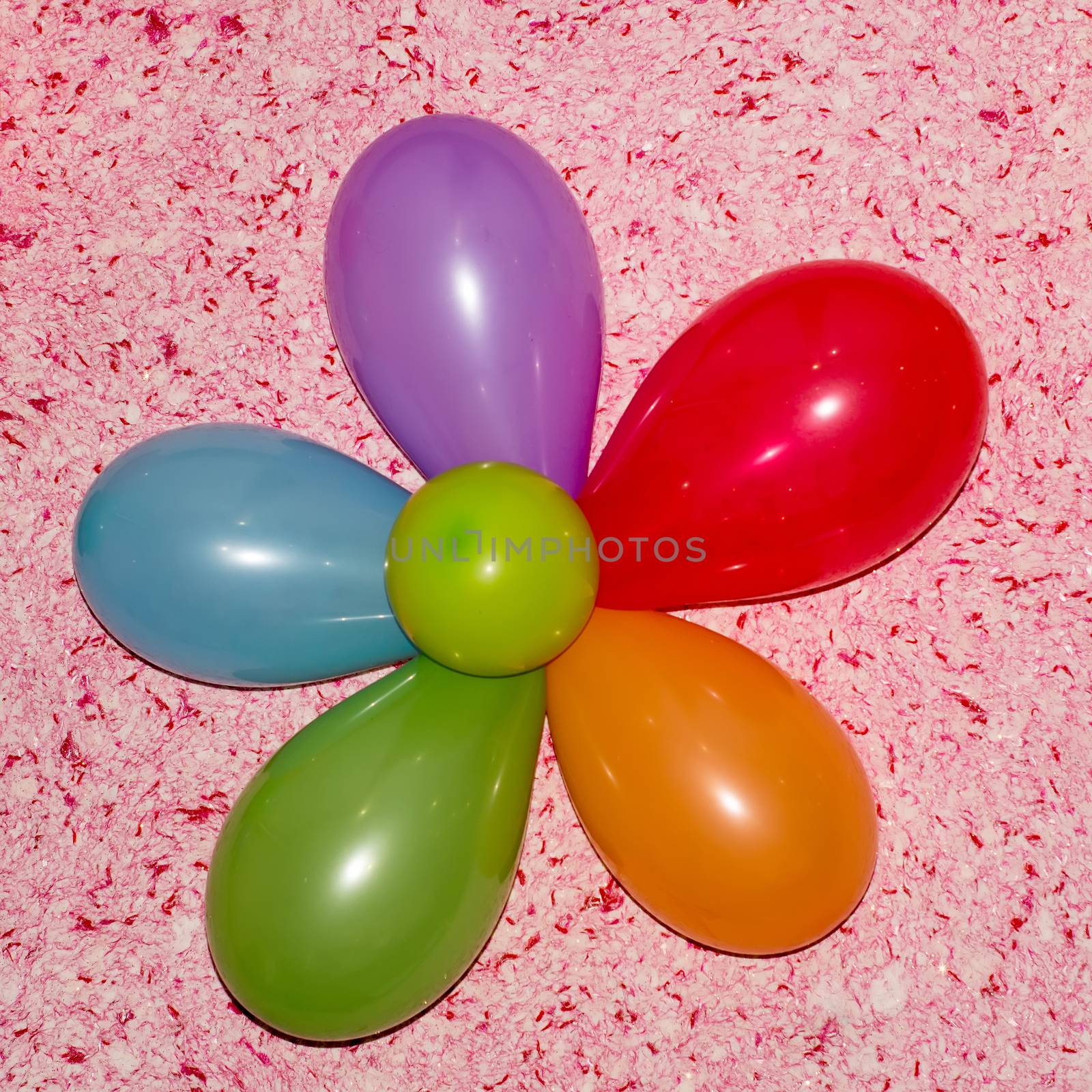 Merry colorful flower with balloons