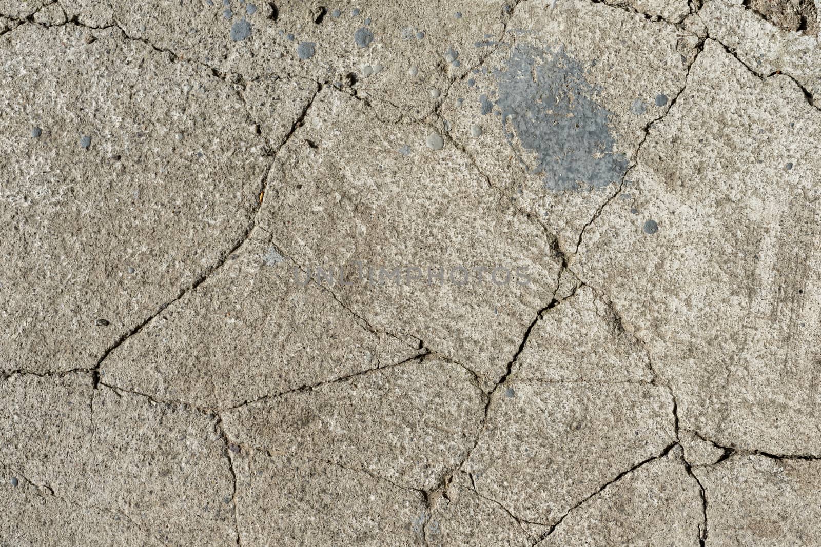 Old gray cracked cement. Large cracks in the concrete by Serhii_Voroshchuk