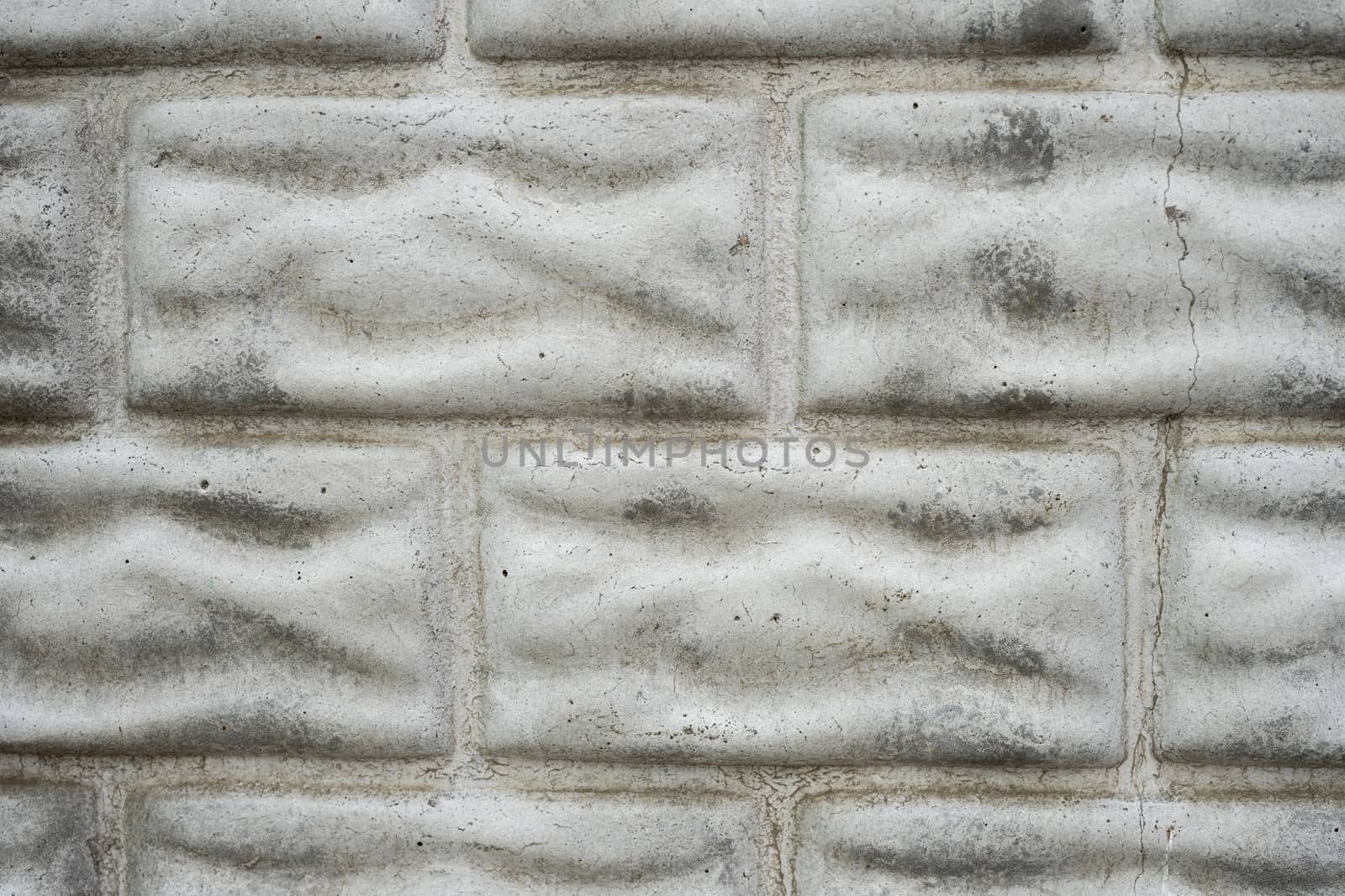 Part of a reinforced concrete fence. Cement fence. Concrete fence