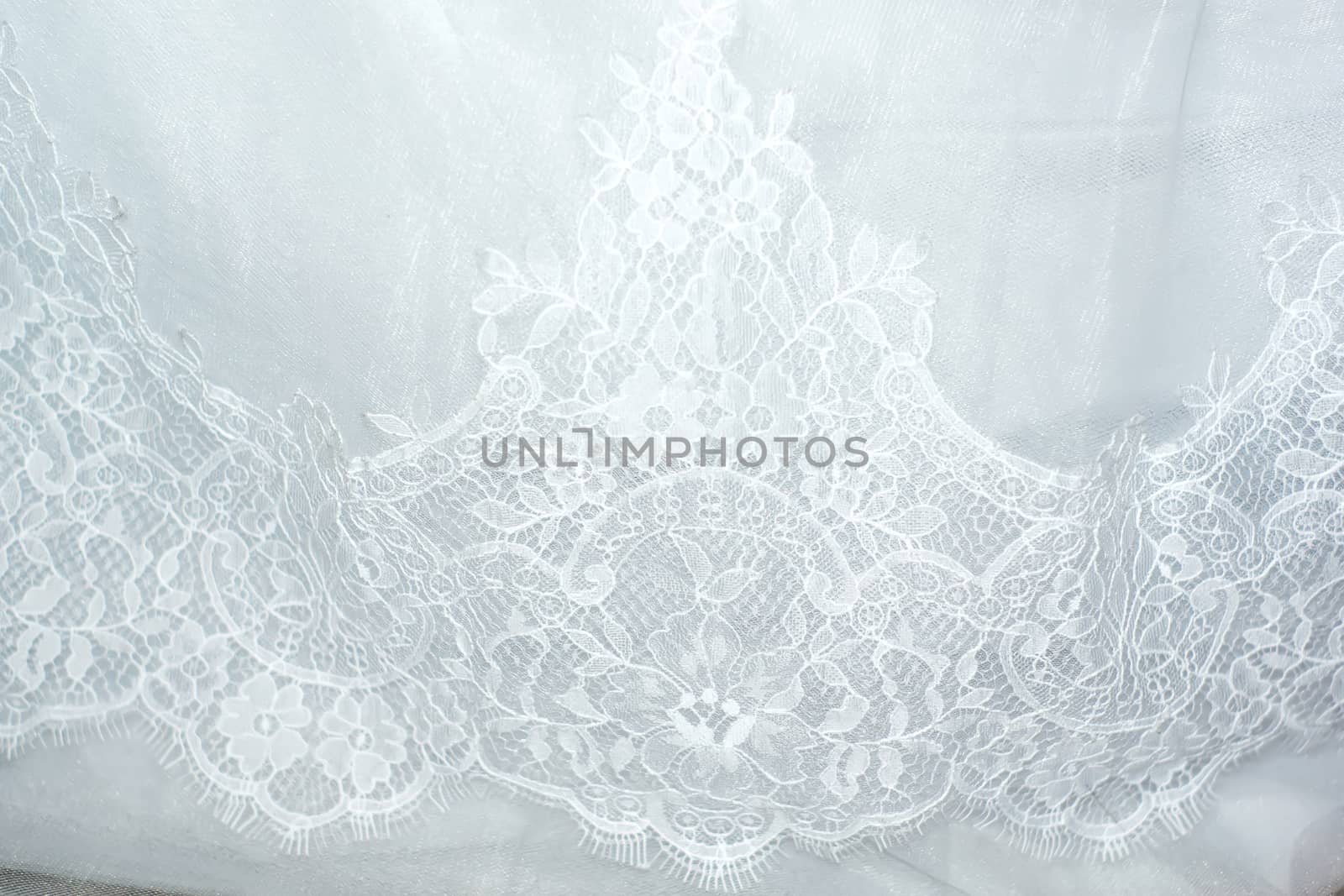 Part of the bride's white dress is decorated with embroidery by Serhii_Voroshchuk