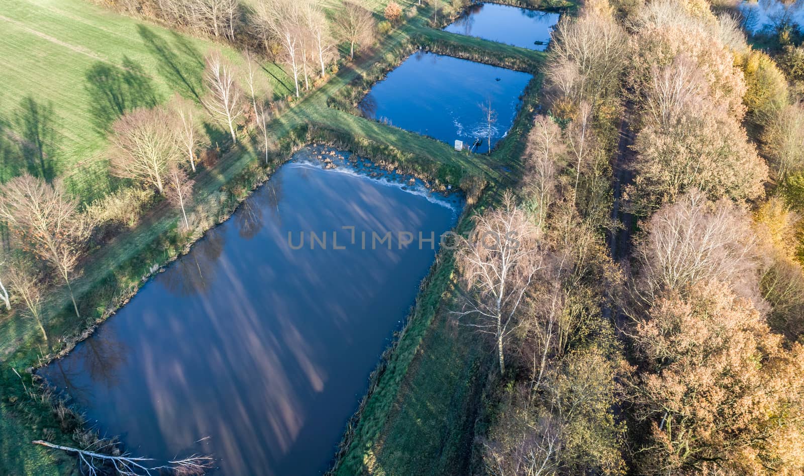 Aerial view of a trout farm with three fish farms, near Wolfsburg, Germany, aerial view with drone