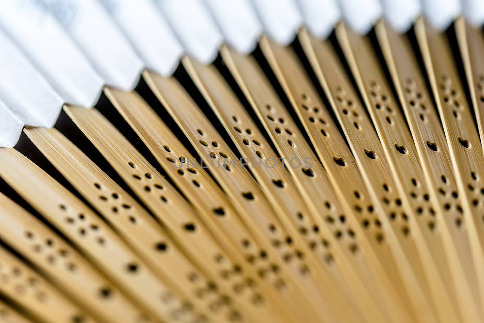 Detailed picture of the arms of a wooden fan, abstract impression, suitable as background