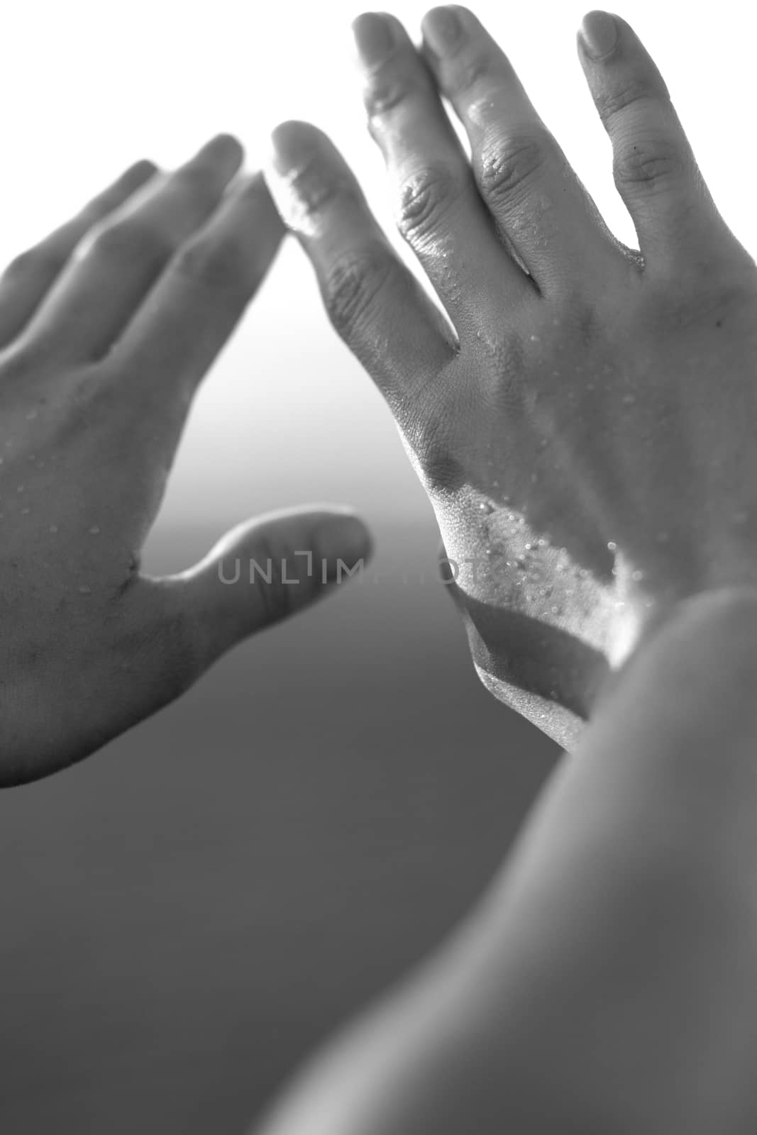 hands finger wet black and white woman skin