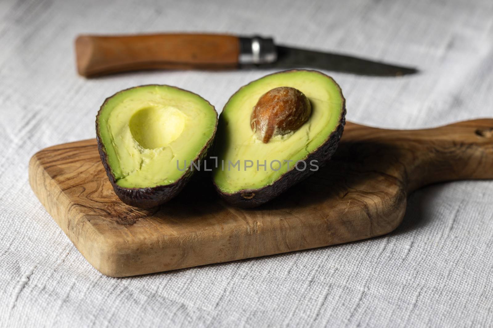 halves of avocado by bernjuer