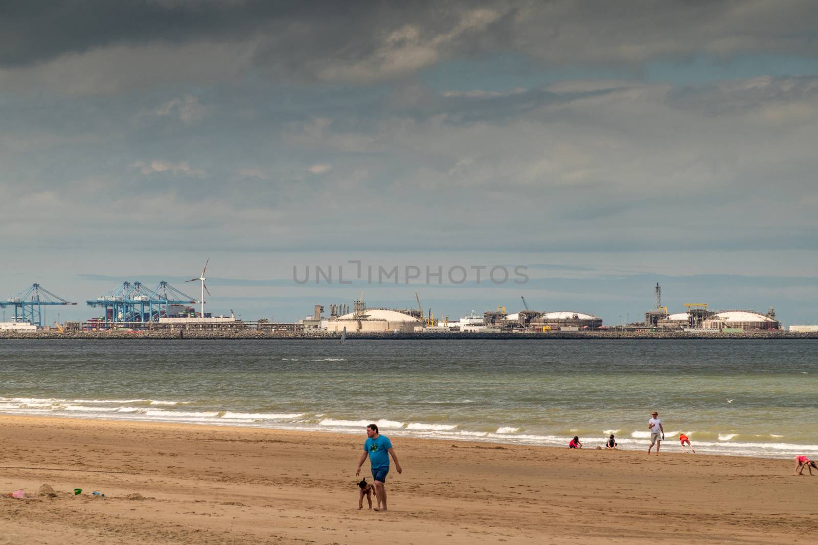 LNG sea terminal seen from beach in Zoute, Knokke-Heist, Belgium by Claudine