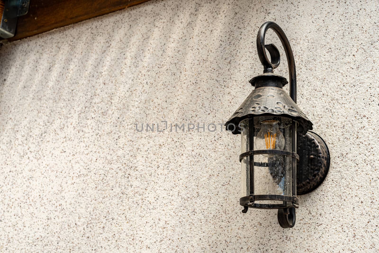 Lamp in vintage style. The lamp is attached to the wall. The lamp is black by Serhii_Voroshchuk