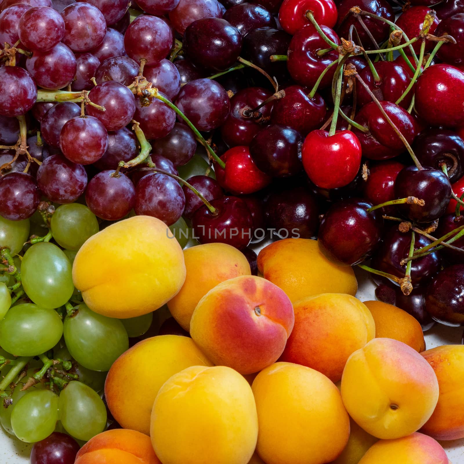 Fruits close up. Bright fruits as a background. Vitamins for a healthy diet. Useful food