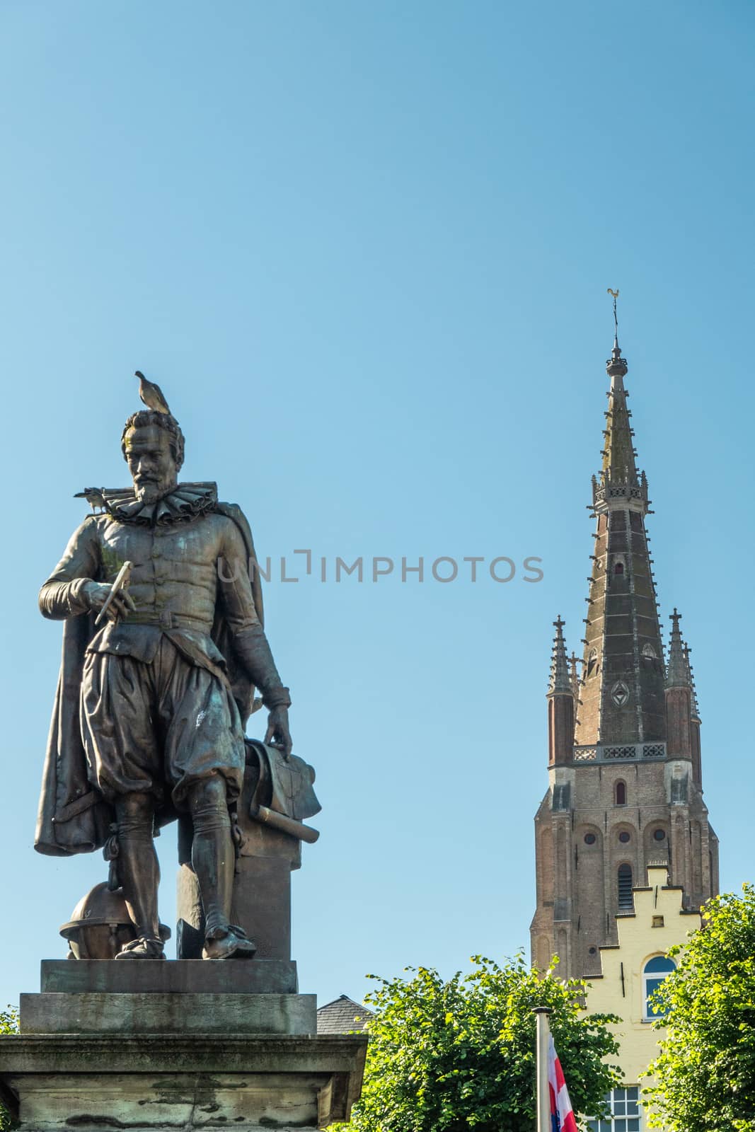 Simon Stevin statue and spire of Notre Dame Church, Bruges, Flan by Claudine