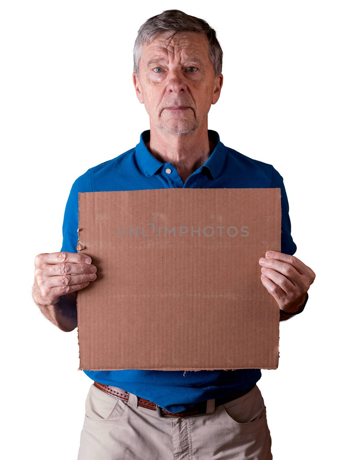 Senior man holding a blank cardboard sign with a sad expression isolated against white by steheap