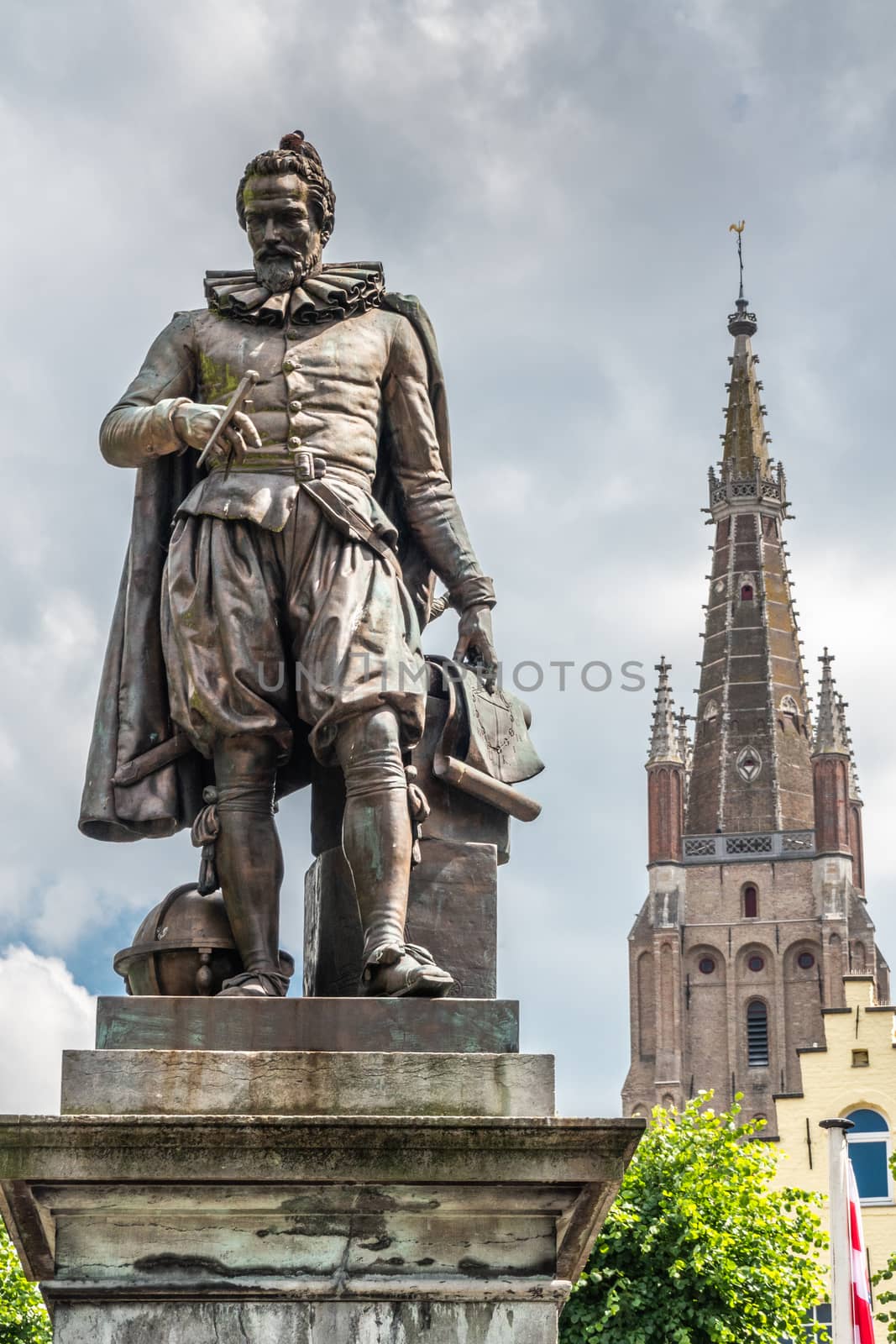 Simon Stevin statue and spire of Notre Dame Church, Bruges, Flan by Claudine