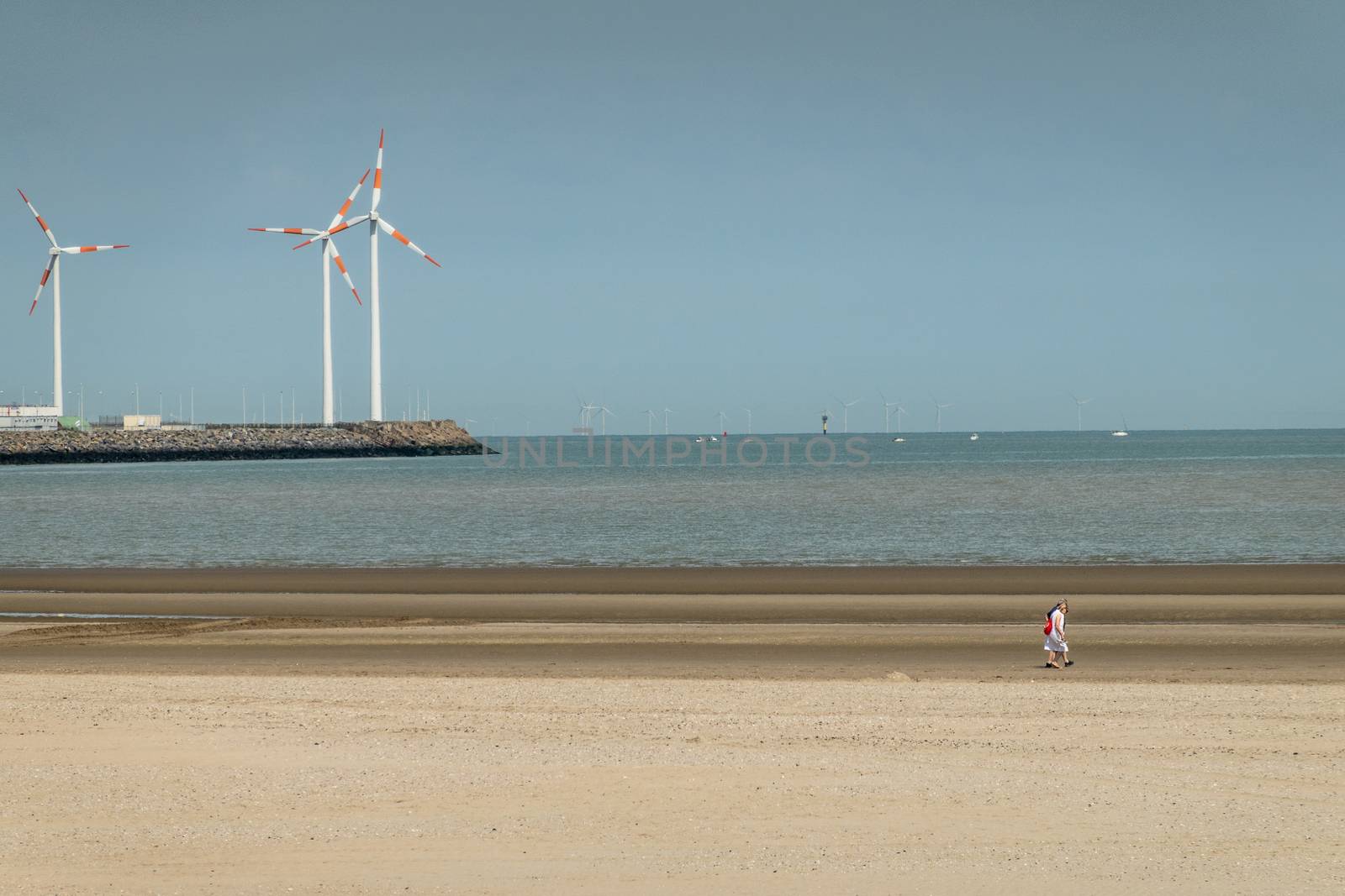Windmills in front of Knokke-Heist, Flanders, Belgium. by Claudine