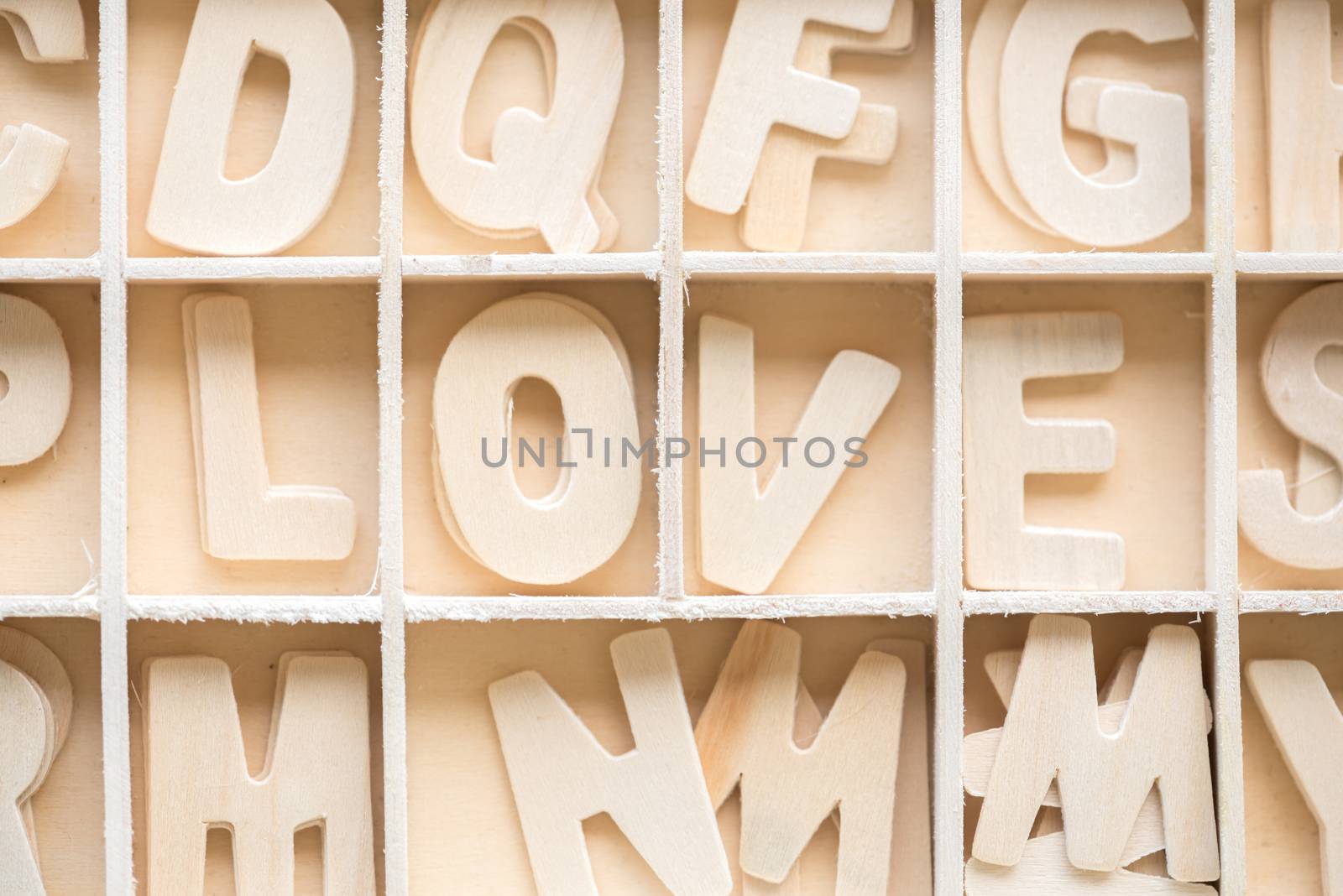 wood alphabet LOVE in the block