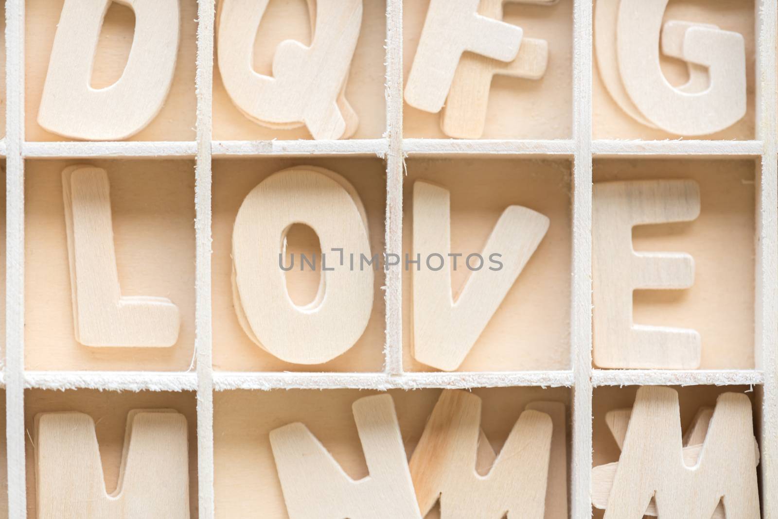 wood alphabet LOVE in the block