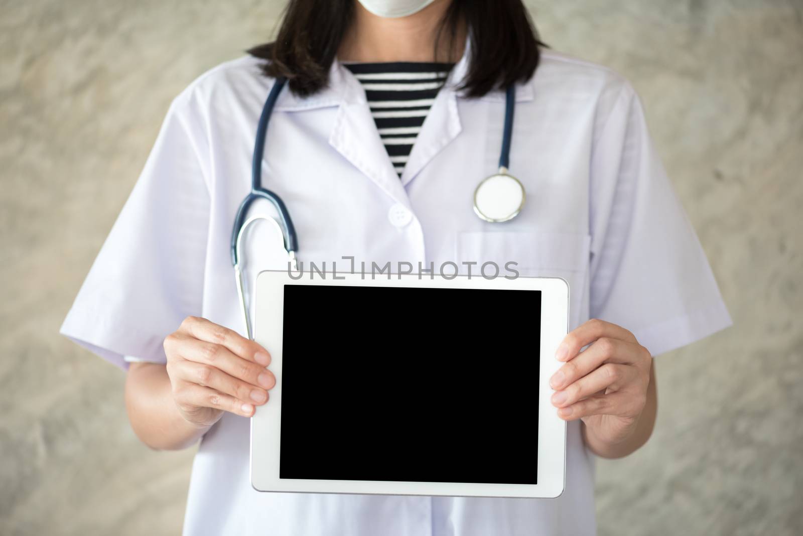 woman doctor showing  tablet screen