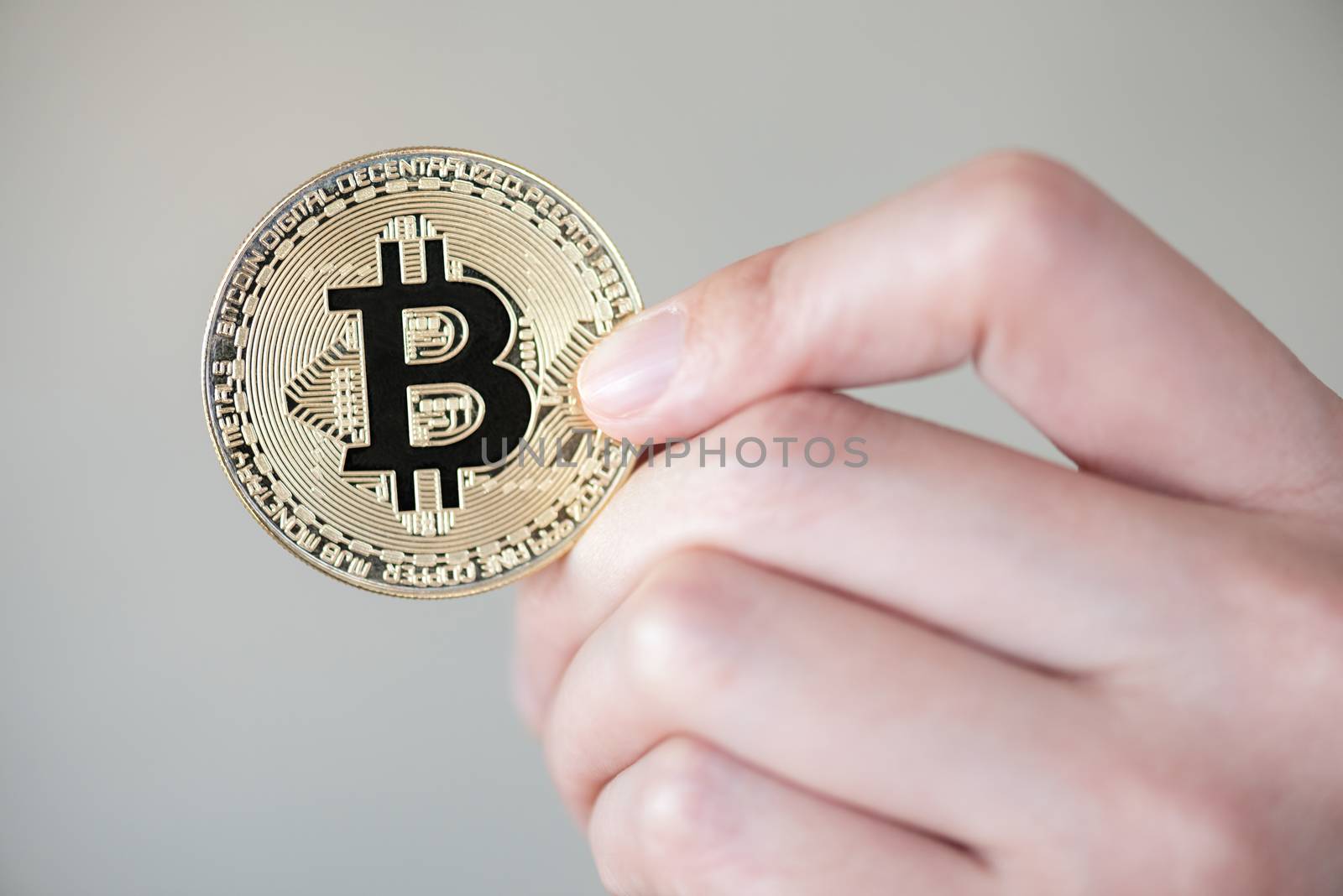 woman hand showing bitcoin digital currency
