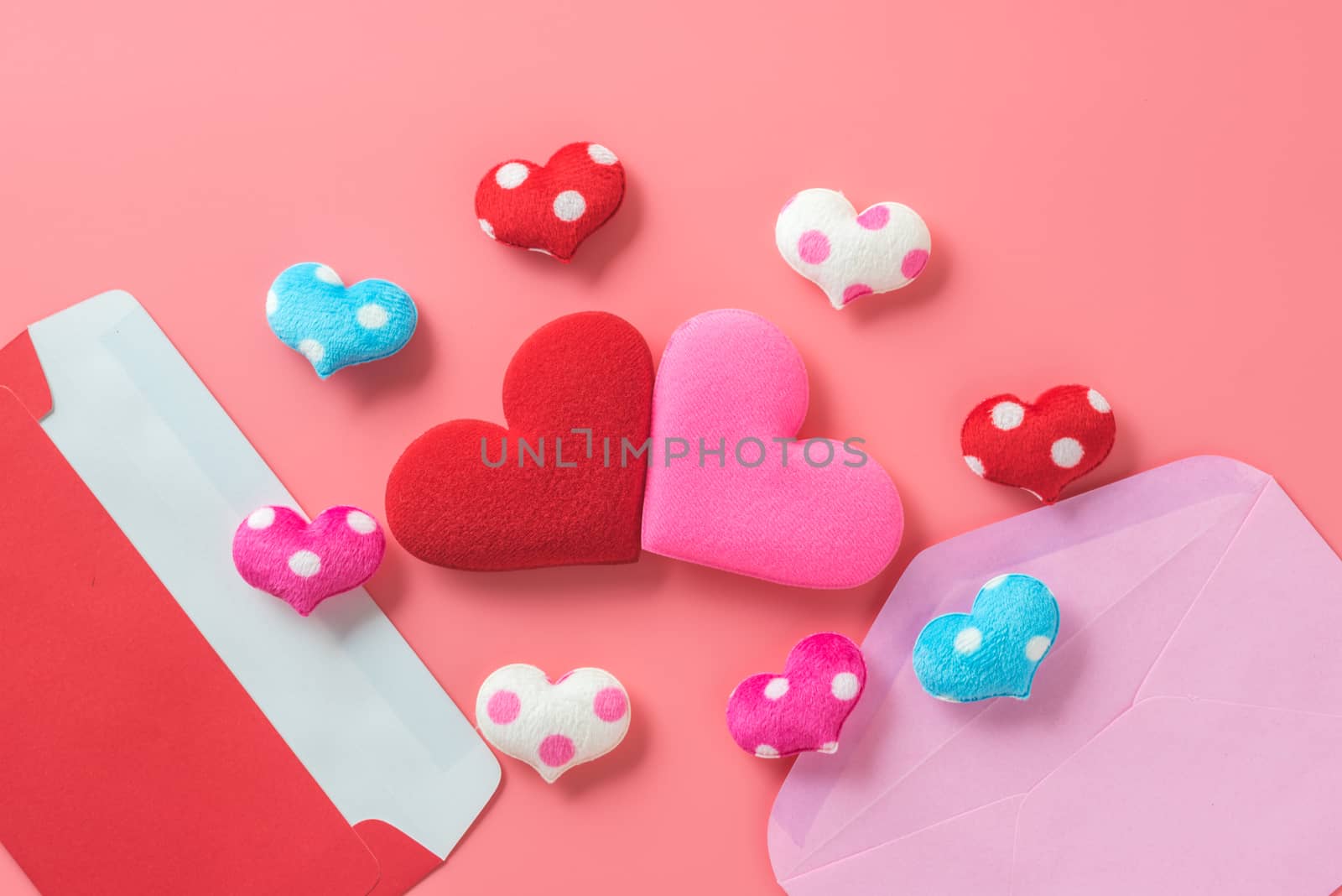 mini heart splash out from red and pink envelop , valentine concept