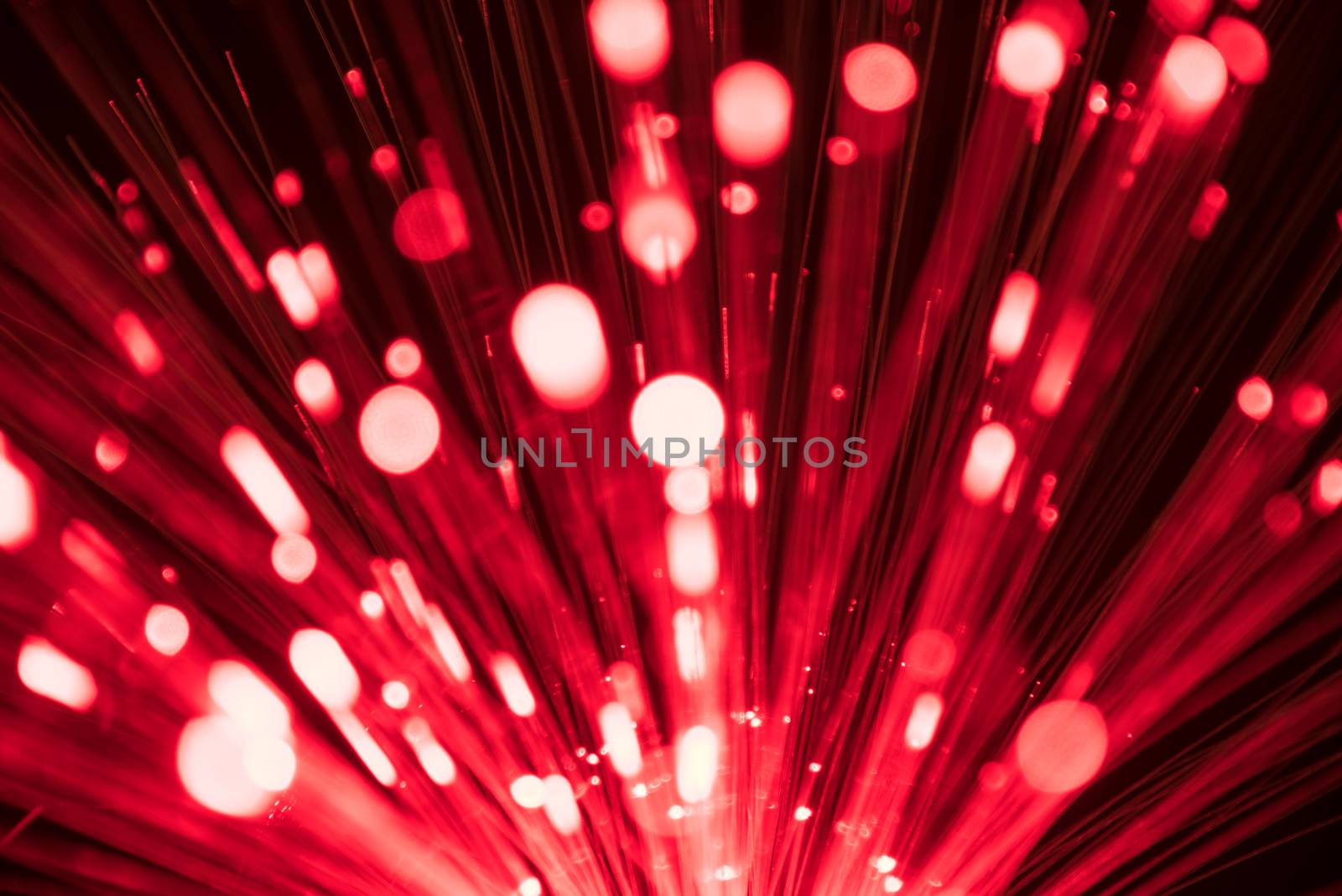 abstract blurred fiber optic light for network or technology background