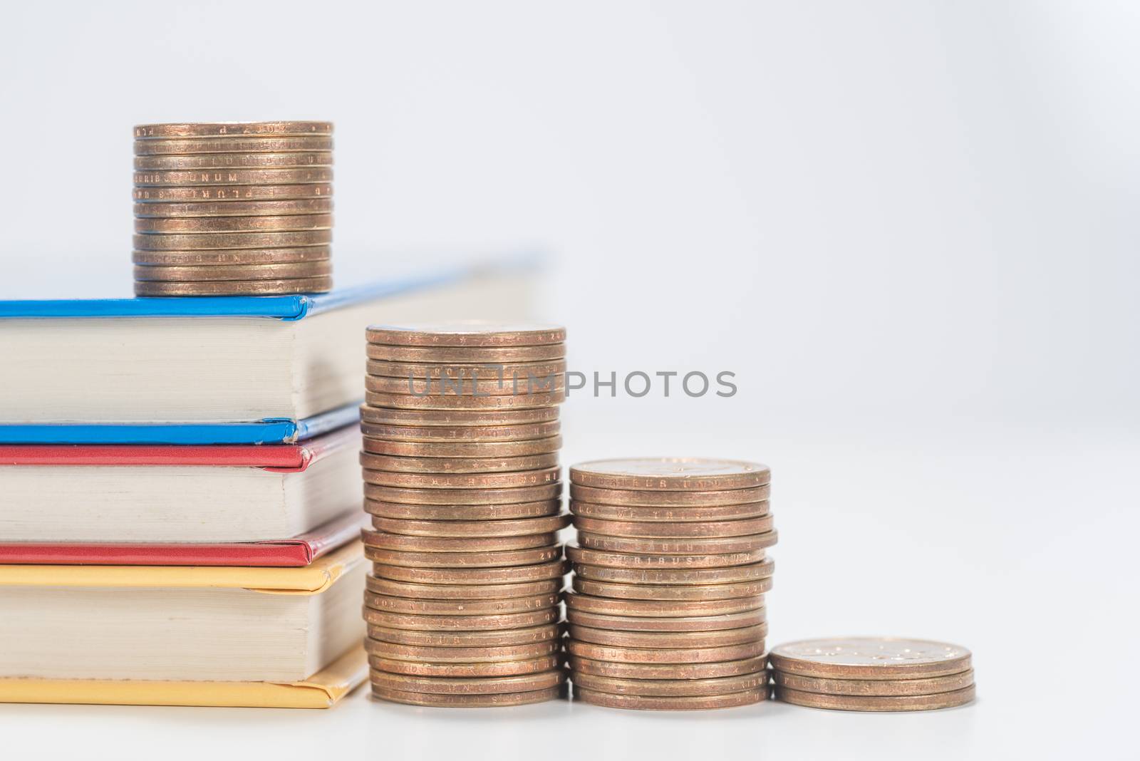 stack of dollars coin on the book