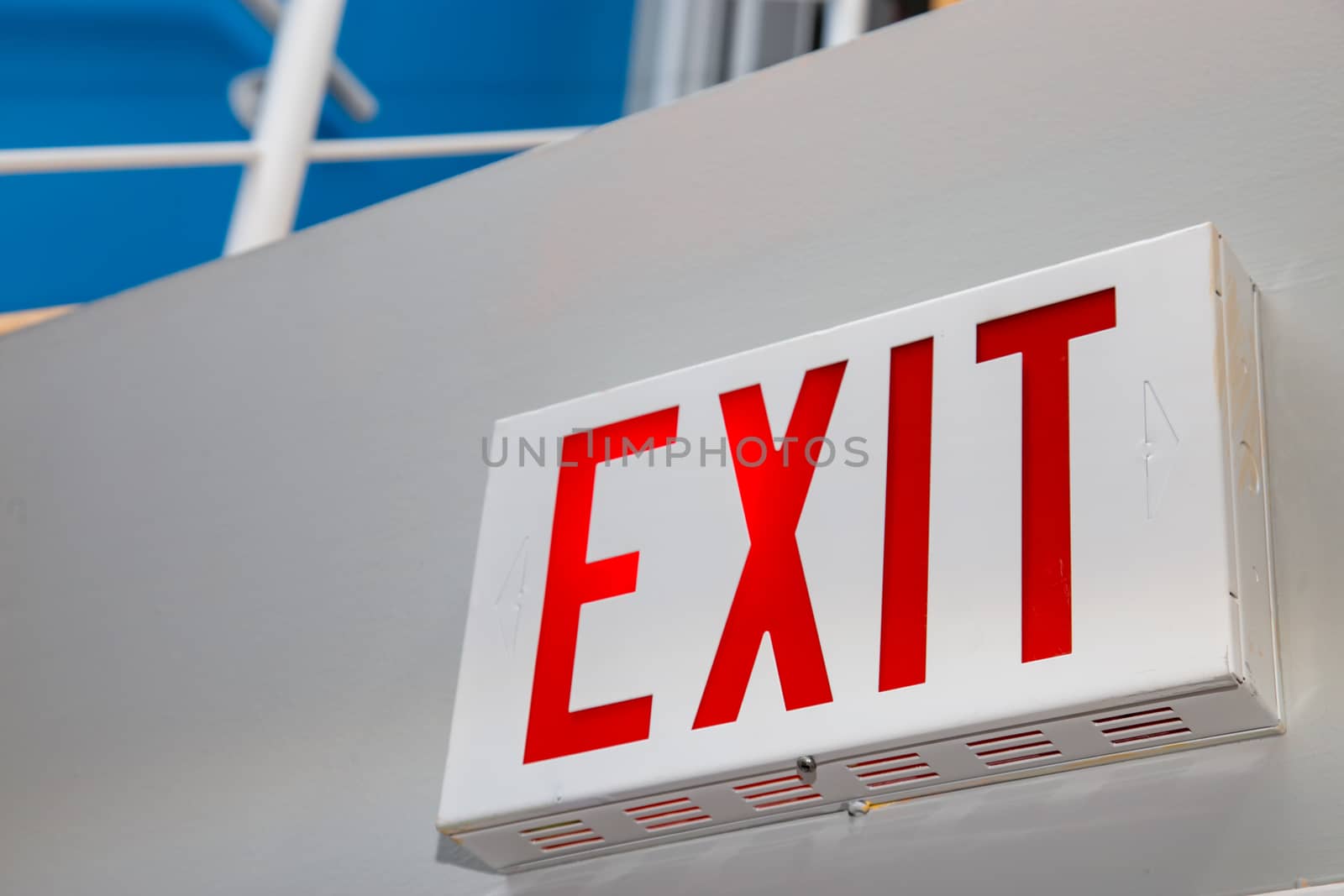 Exit Sign on a White Wall in Perspective by colintemple