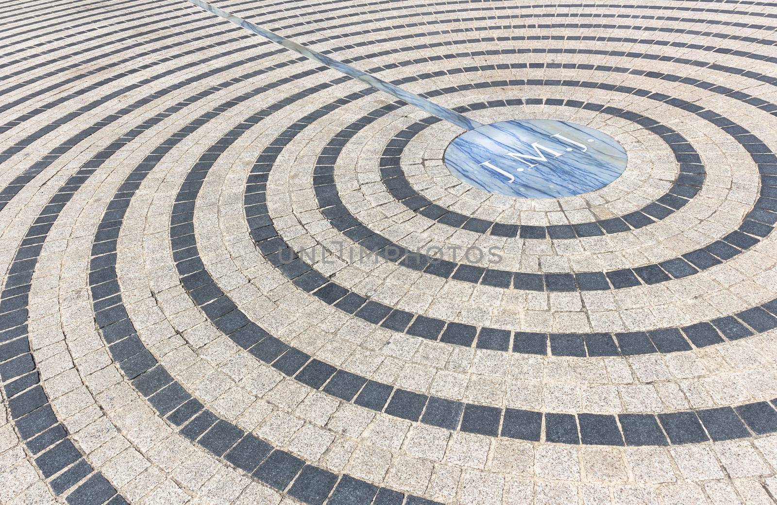 Close-up of pavement with concentric pattern. Patterned floor walkway of the large square of a church.