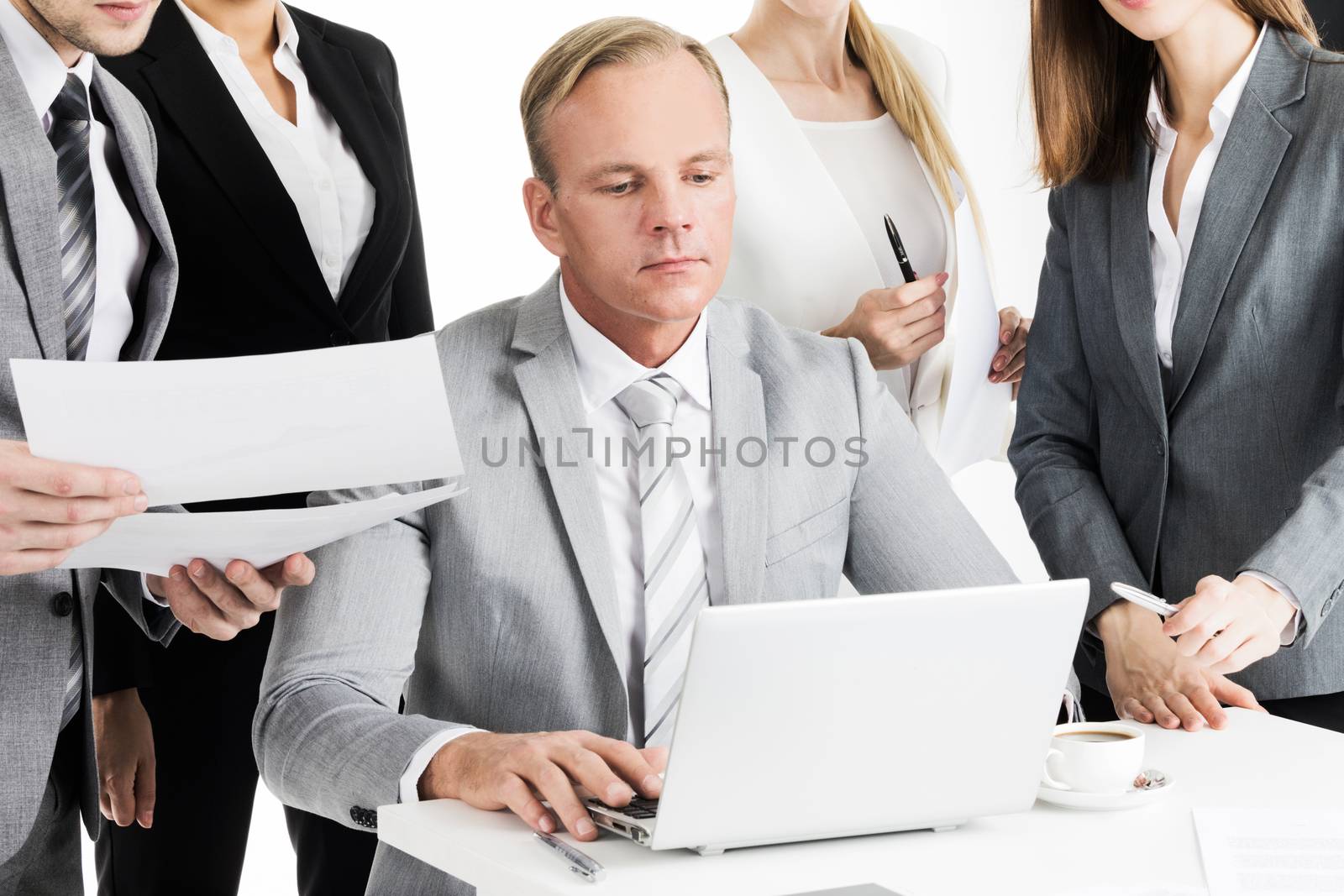 Business people working in office. Business men handing over documents to leader senior manager