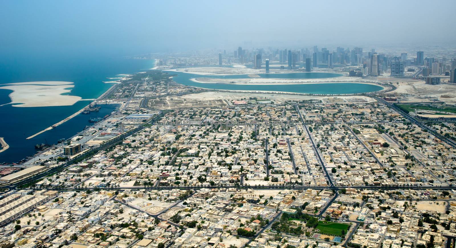 Aerial view of Dubai city with apartments and skyscraper (United Arab Emirates)