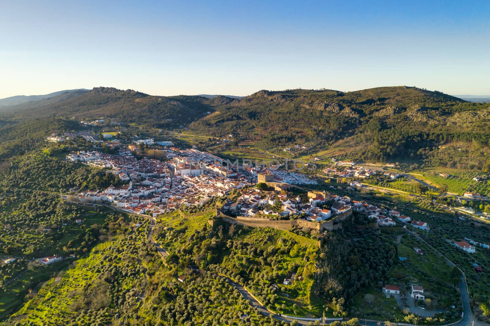 Castelo de Vide drone aerial view in Alentejo, Portugal from Serra de Sao Mamede mountains by Luispinaphotography