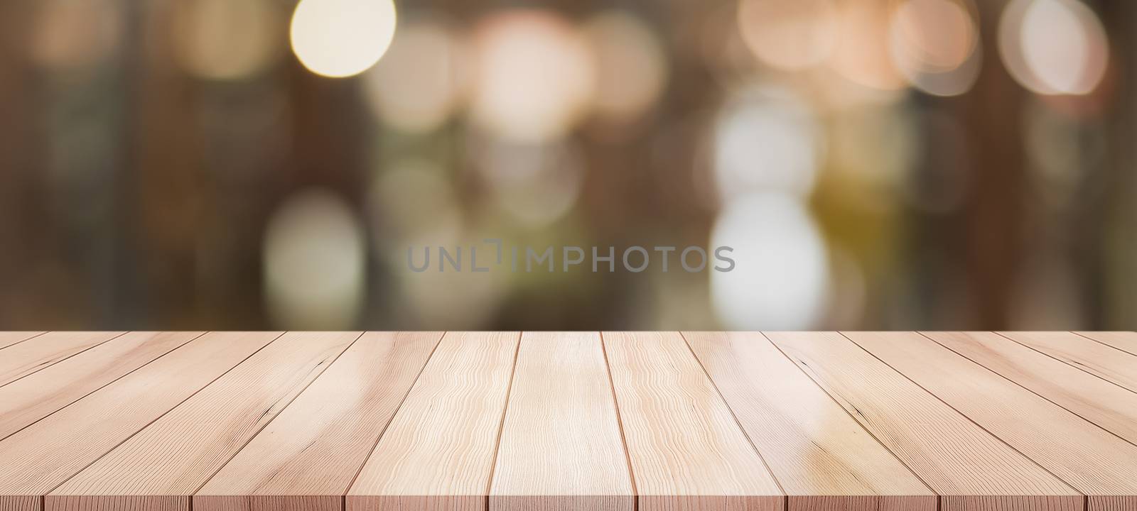 Empty wooden table top with lights bokeh on blur restaurant back by ChaveeKu