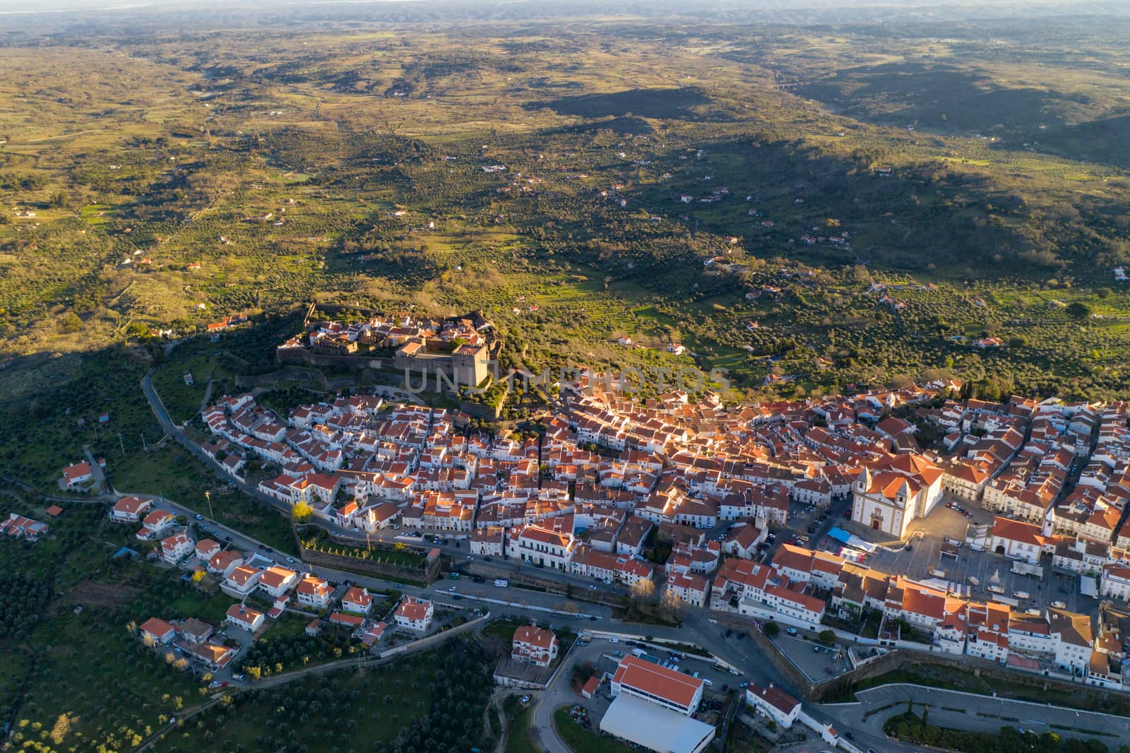 Castelo de Vide drone aerial view in Alentejo, Portugal from Serra de Sao Mamede mountains by Luispinaphotography