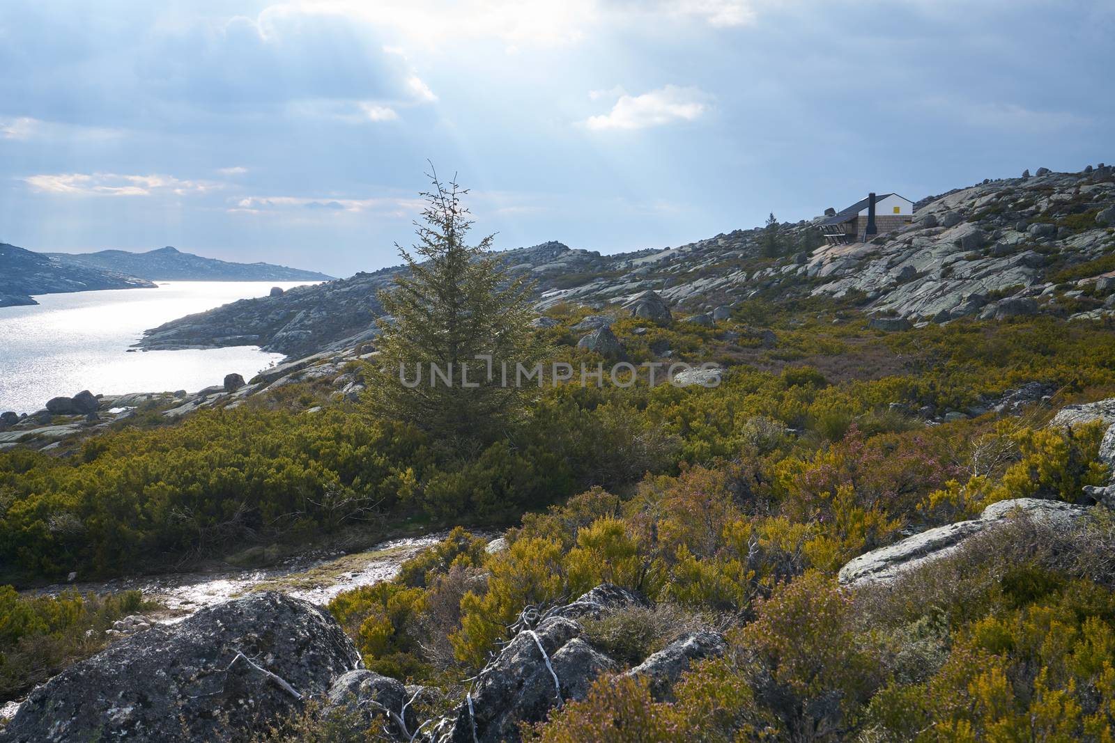 Beautiful house social distancing in lake Lagoa comprida lagoon in Serra da Estrela, Portugal