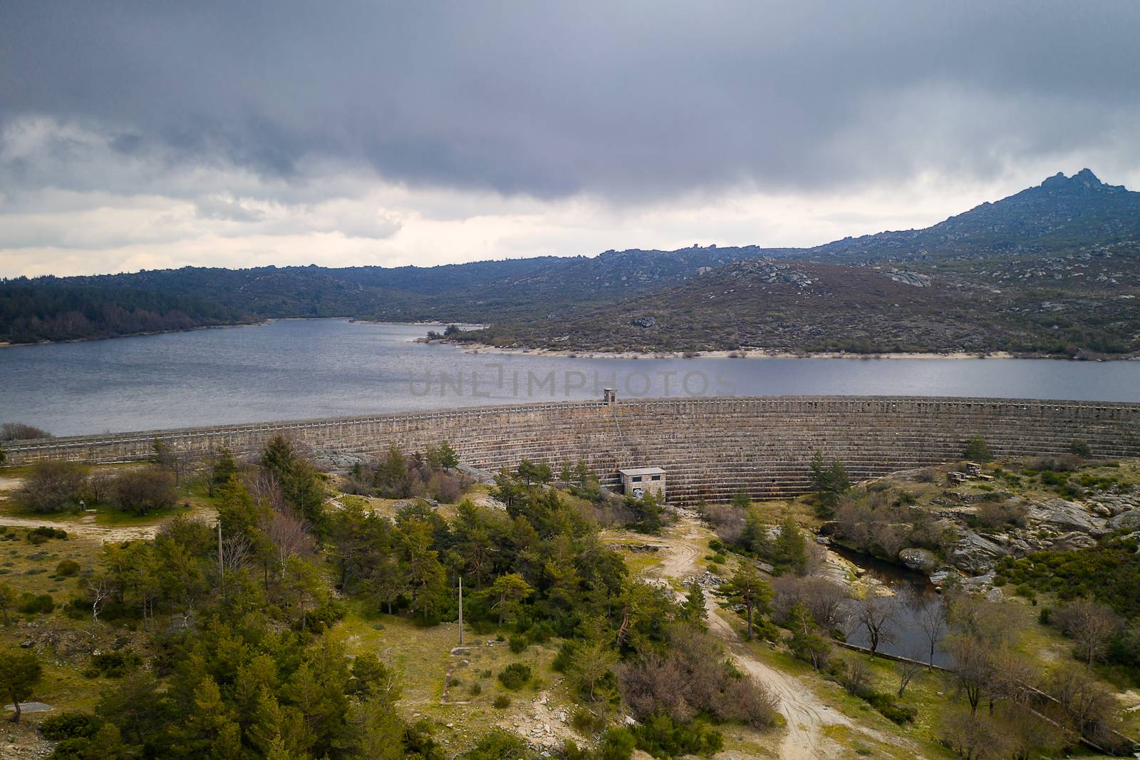 Landscape drone aerial view of Vale do Rossim dam in Serra da Estrela, Portugal by Luispinaphotography